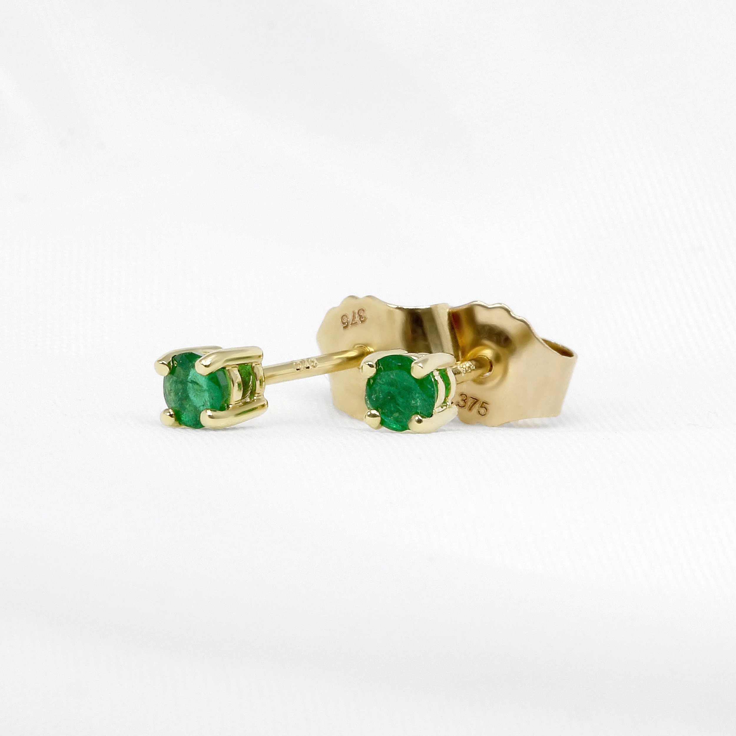 Claw Set Emerald Stud Earrings in Yellow Gold