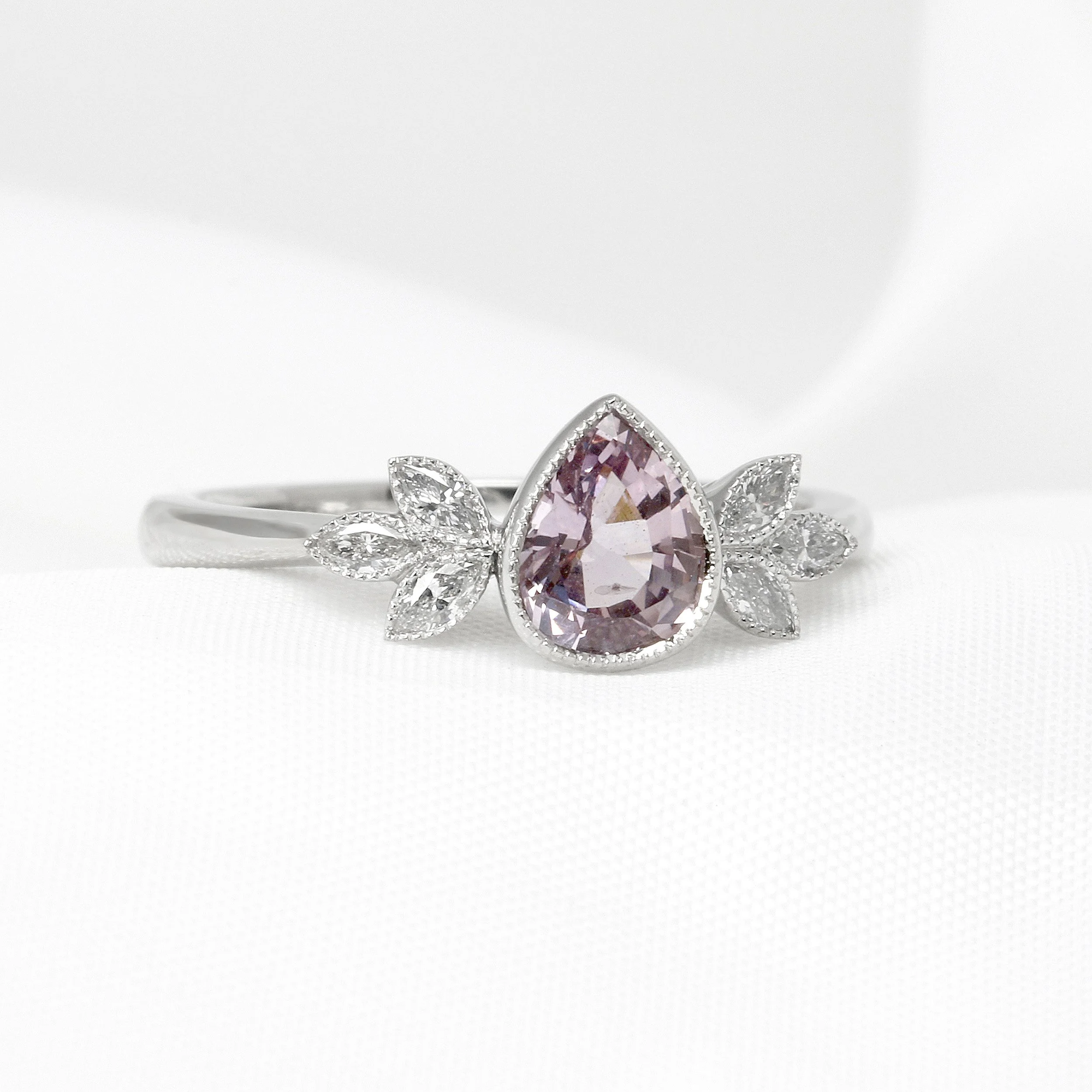 Pear Shape Pink Sapphire & Diamond Ring in Platinum