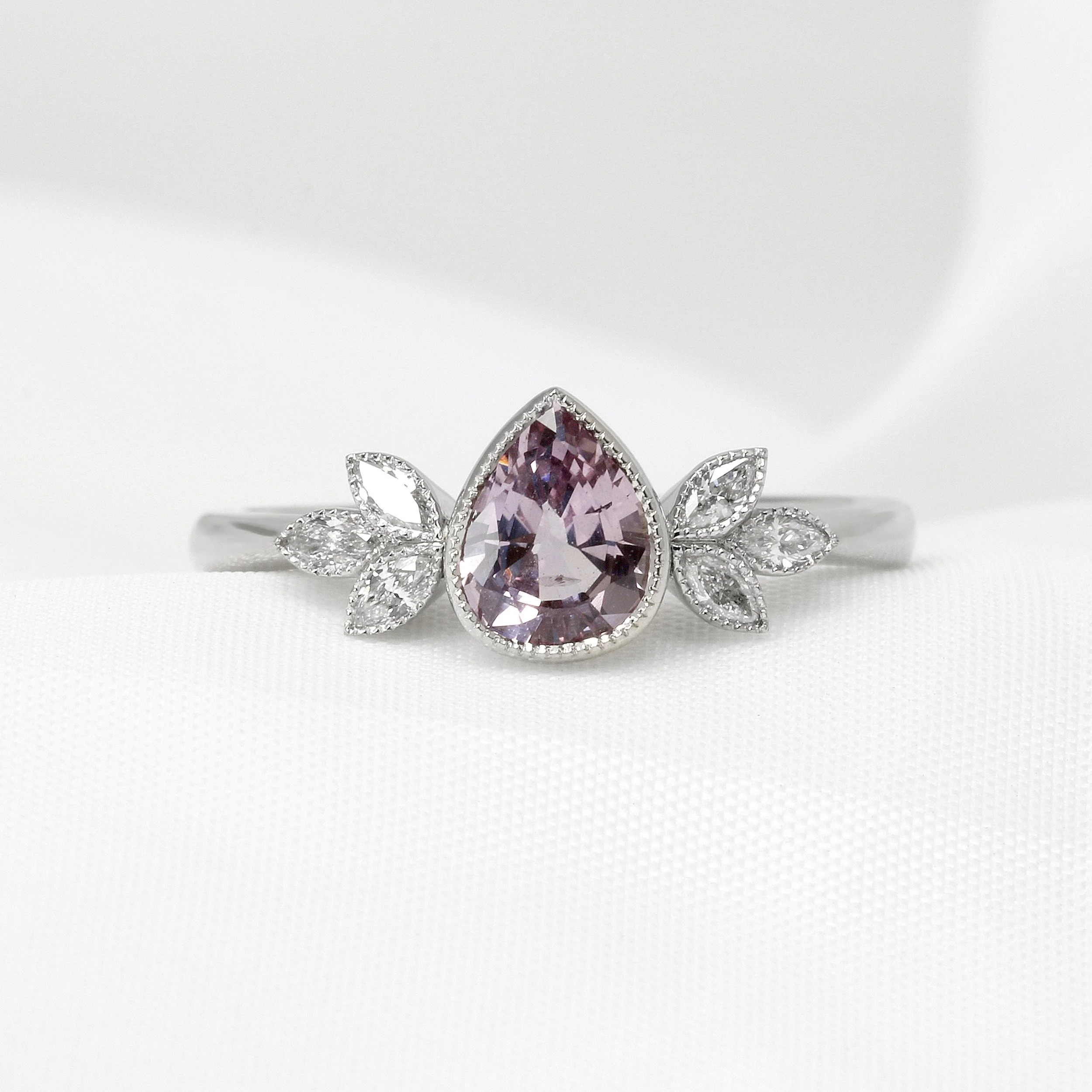 Pear Shape Pink Sapphire & Diamond Ring in Platinum