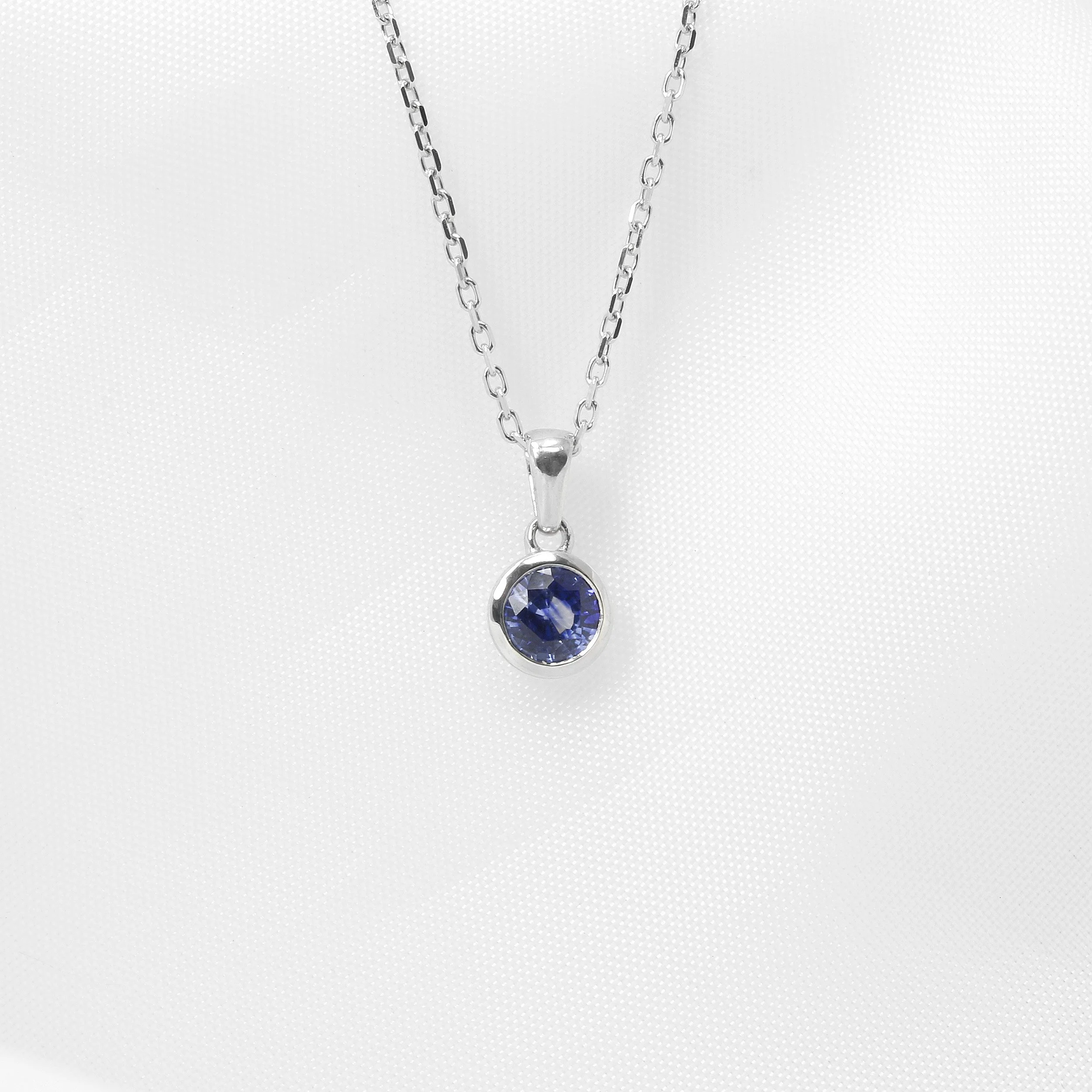 Round Sapphire Pendant in 9ct White Gold