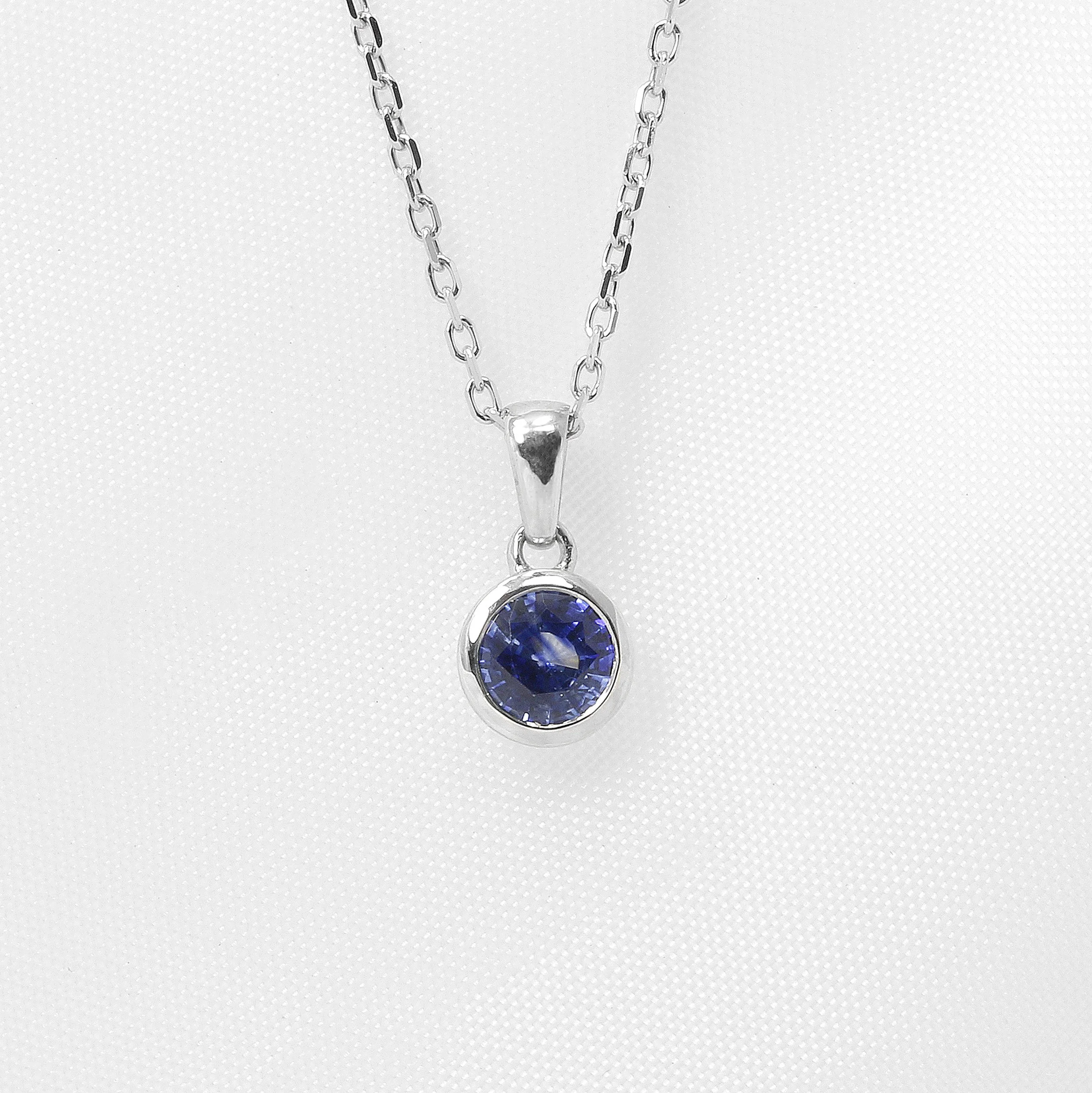 Round Sapphire Pendant in 9ct White Gold