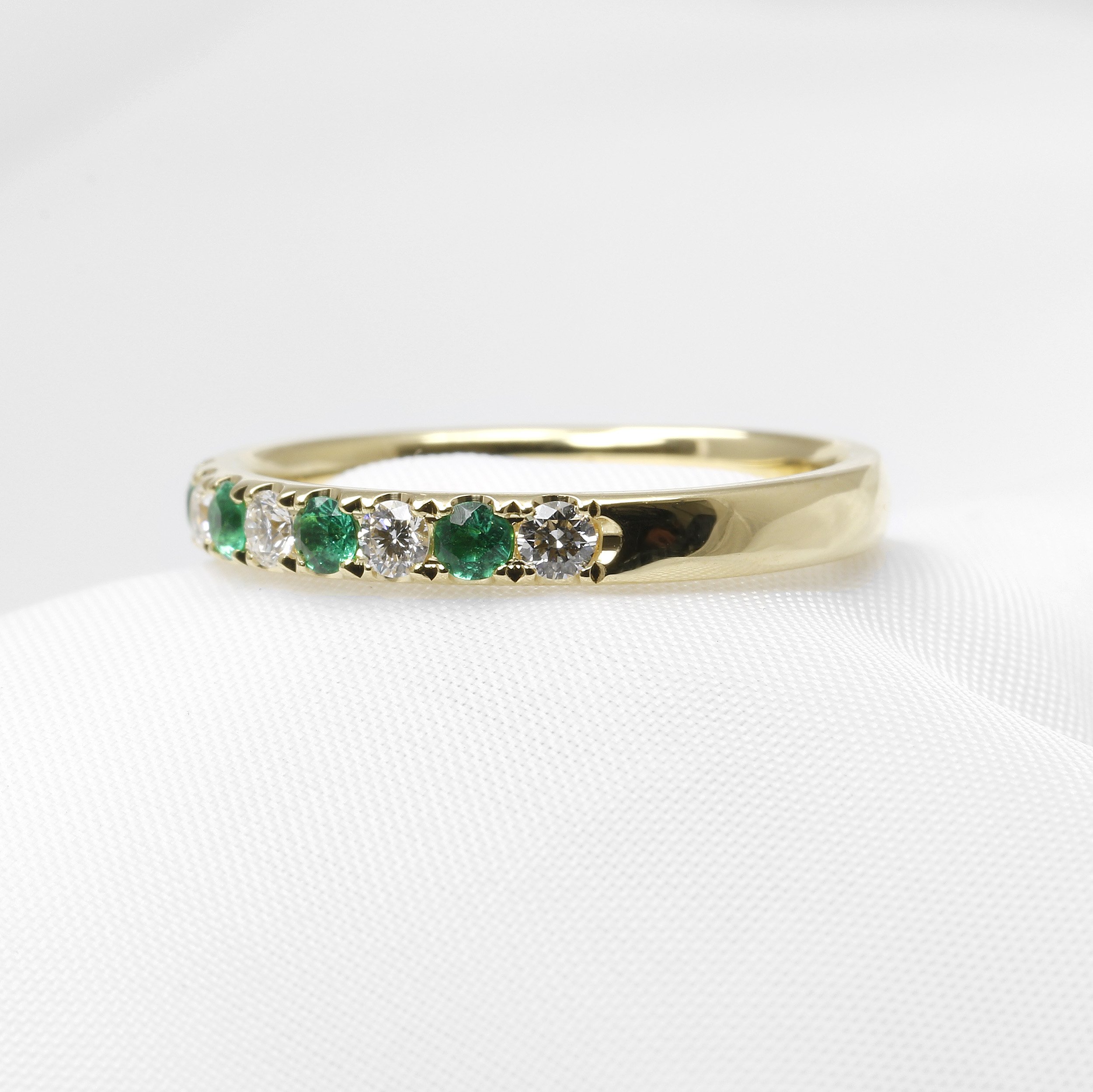 Emerald and Diamond Half Eternity Ring in 18ct Gold