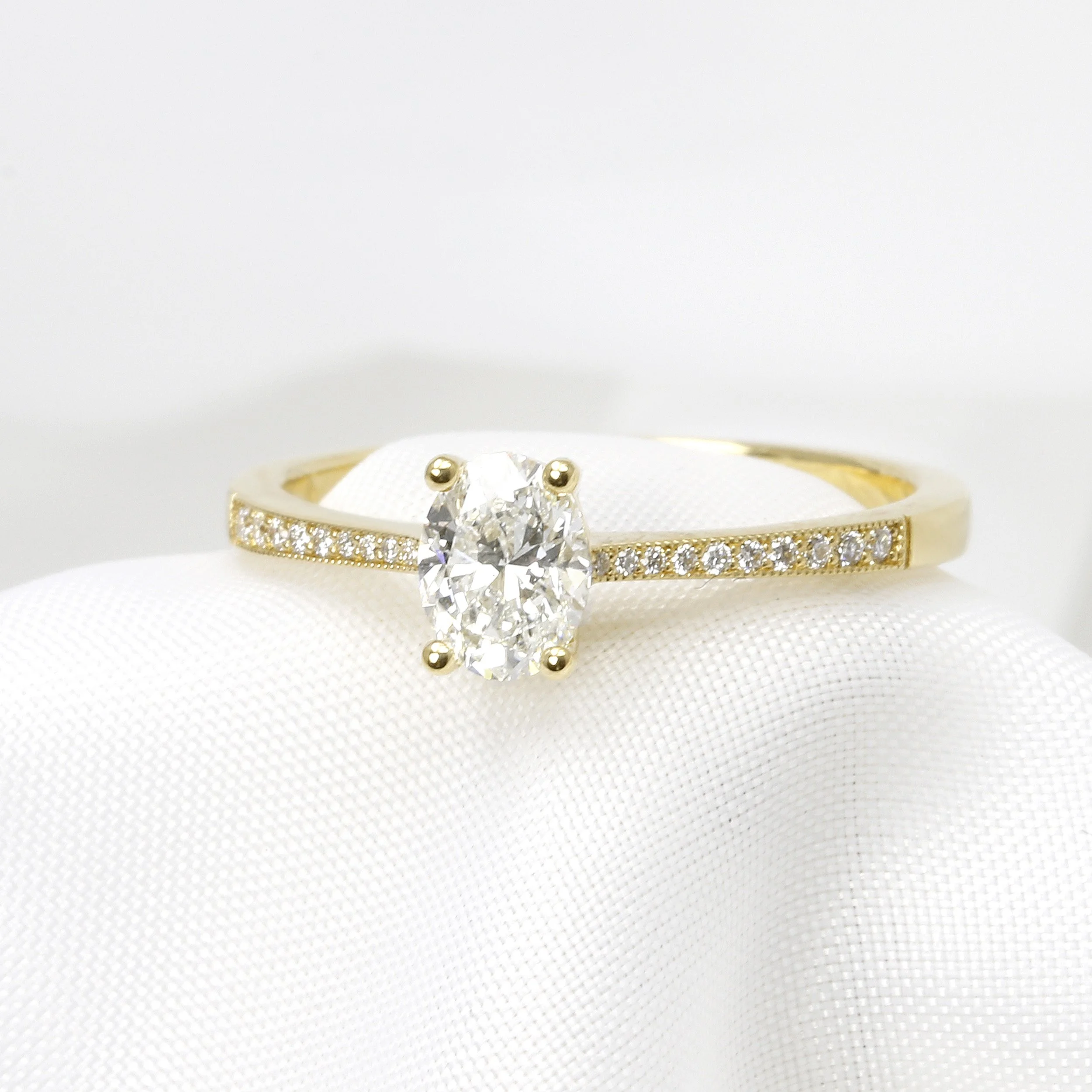 Oval Diamond Ring with Stone Set Shoulders