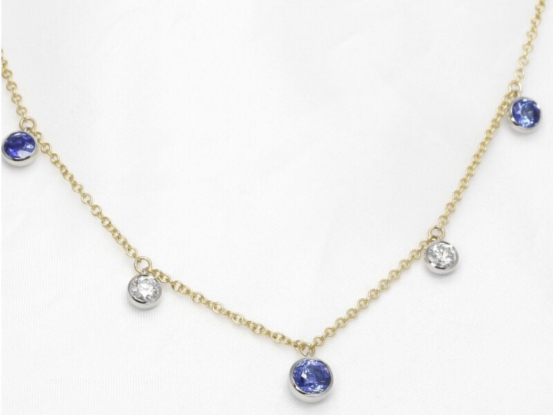 Sapphire and Diamond Station Drop Necklace in Platinum and Yellow Gold