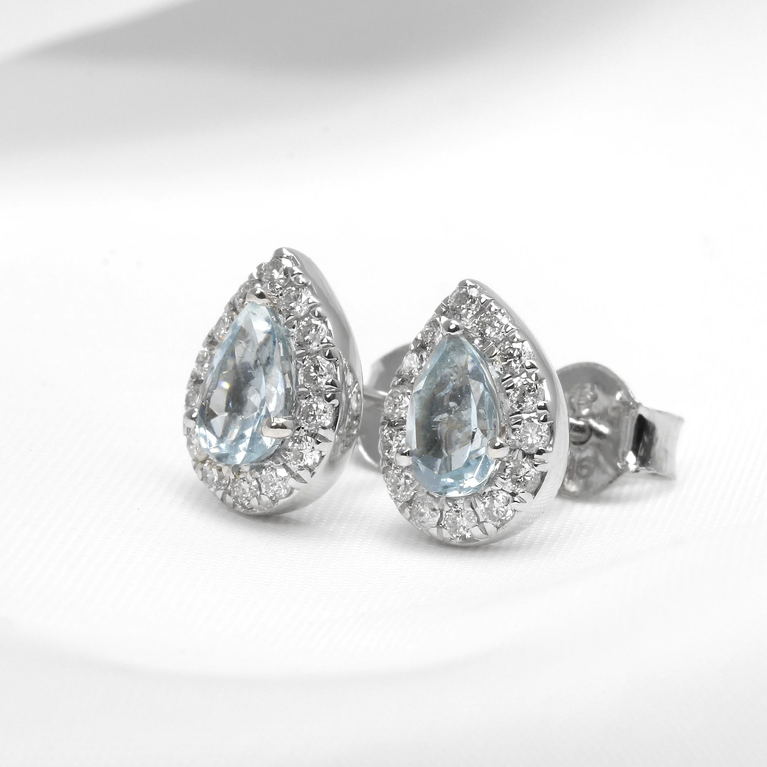 Aquamarine and Diamond Halo Stud Earrings in White Gold