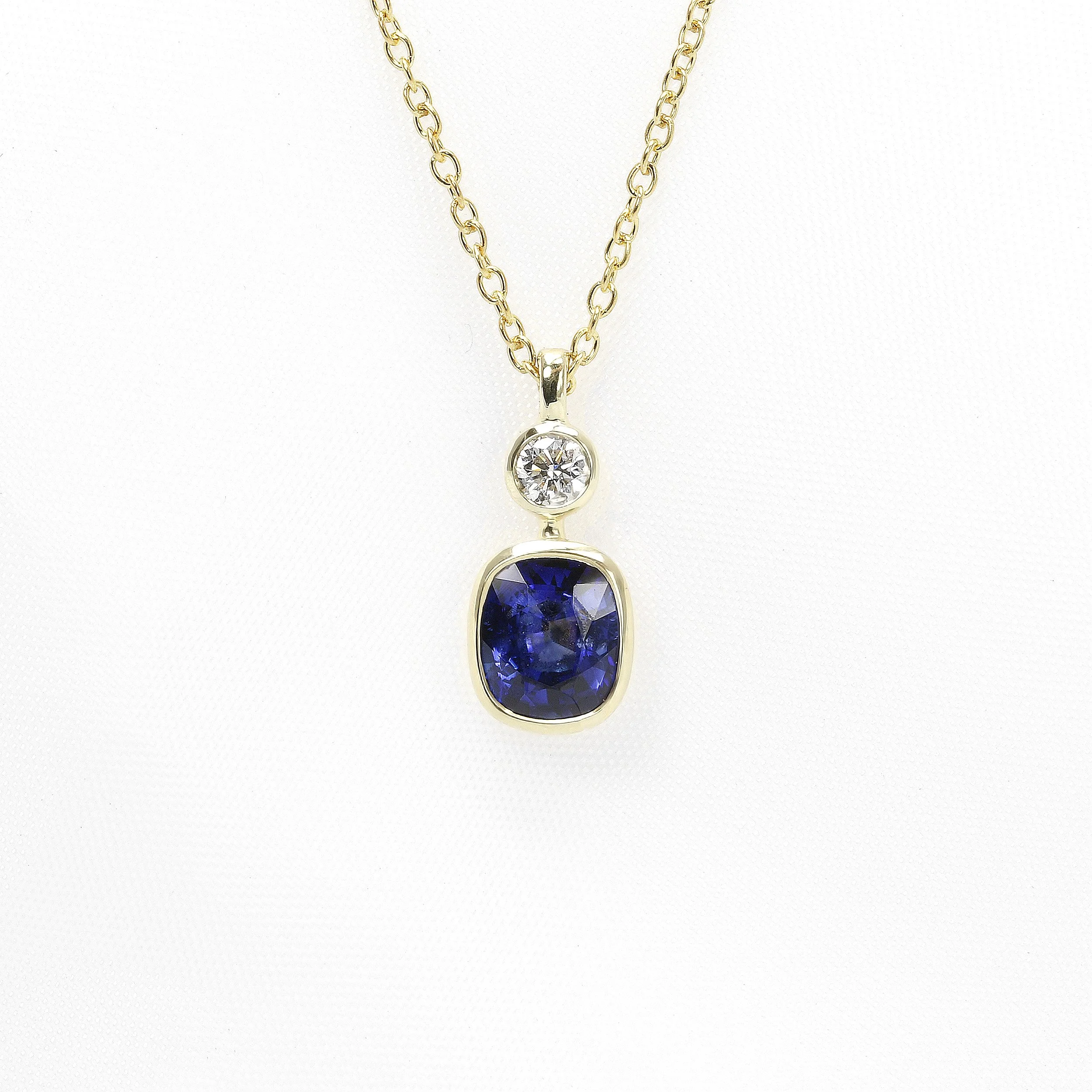 Cushion Sapphire and Diamond Pendant in Yellow Gold