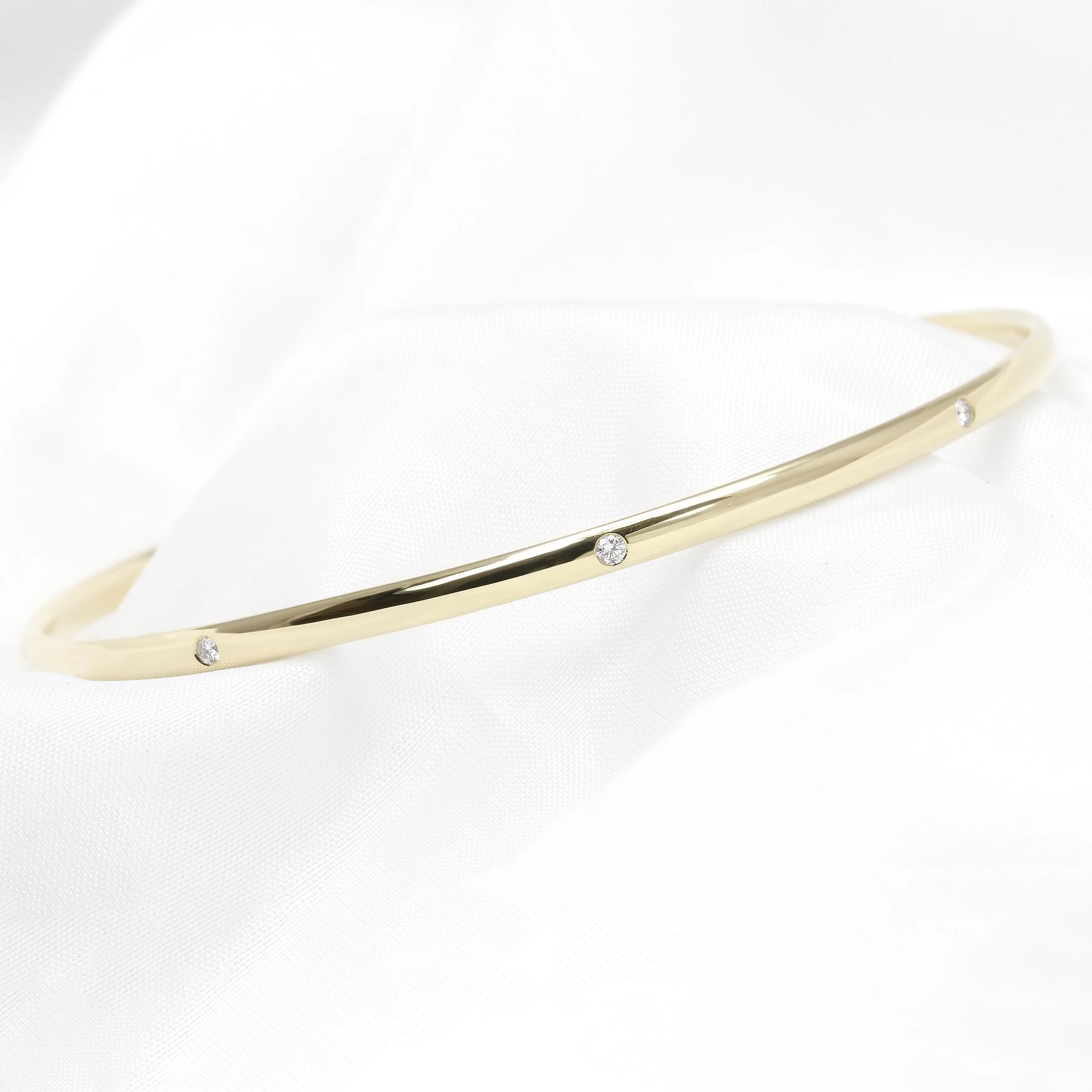 Flush Set Diamond Bangle in Yellow Gold