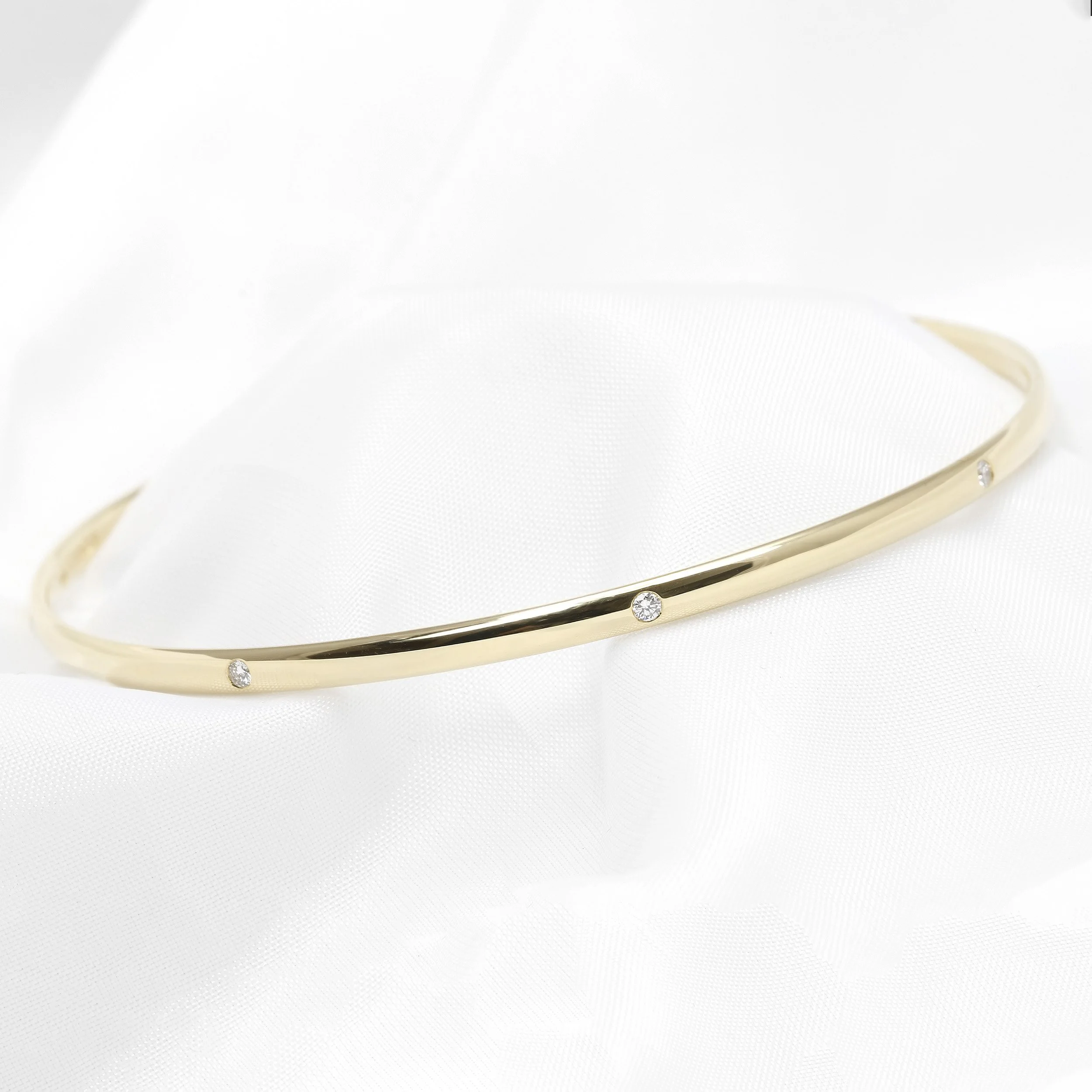 Flush Set Diamond Bangle in Yellow Gold