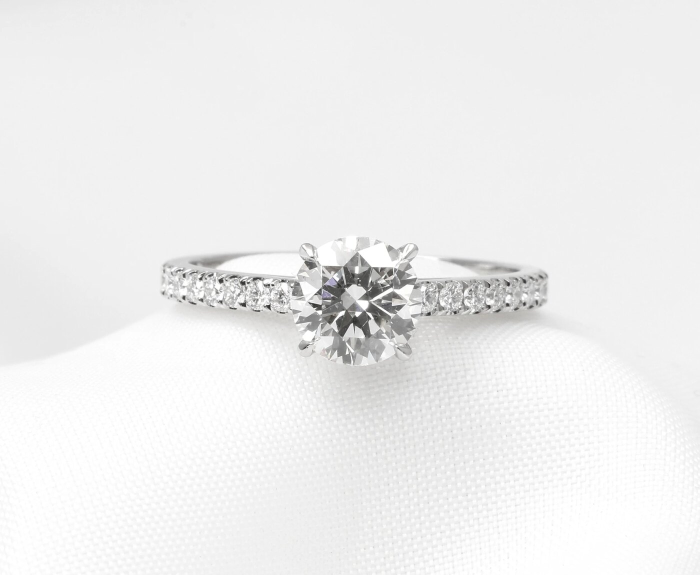 Solitaire Diamond Ring with Shoulders in Platinum