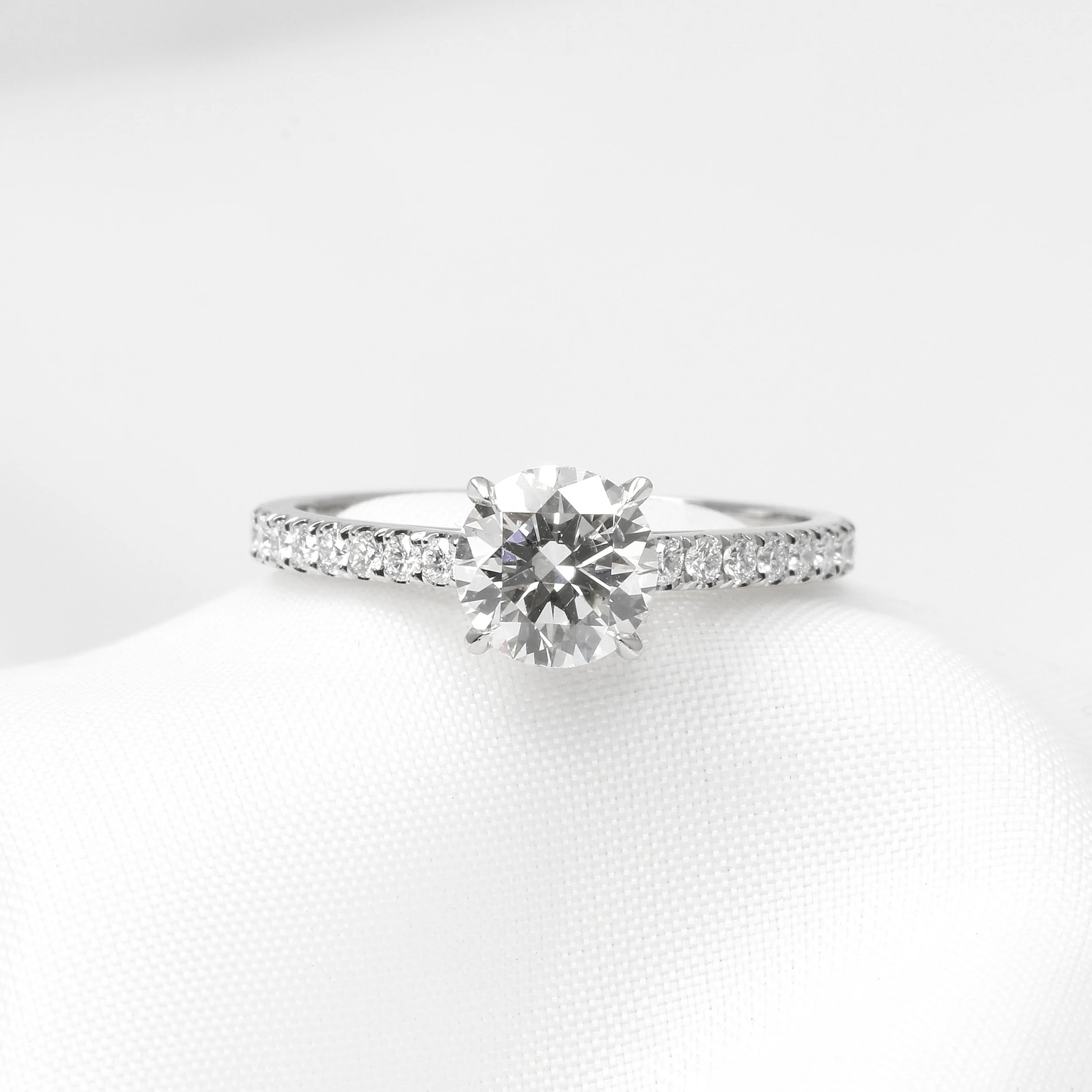 Solitaire Diamond Ring with Shoulders in Platinum