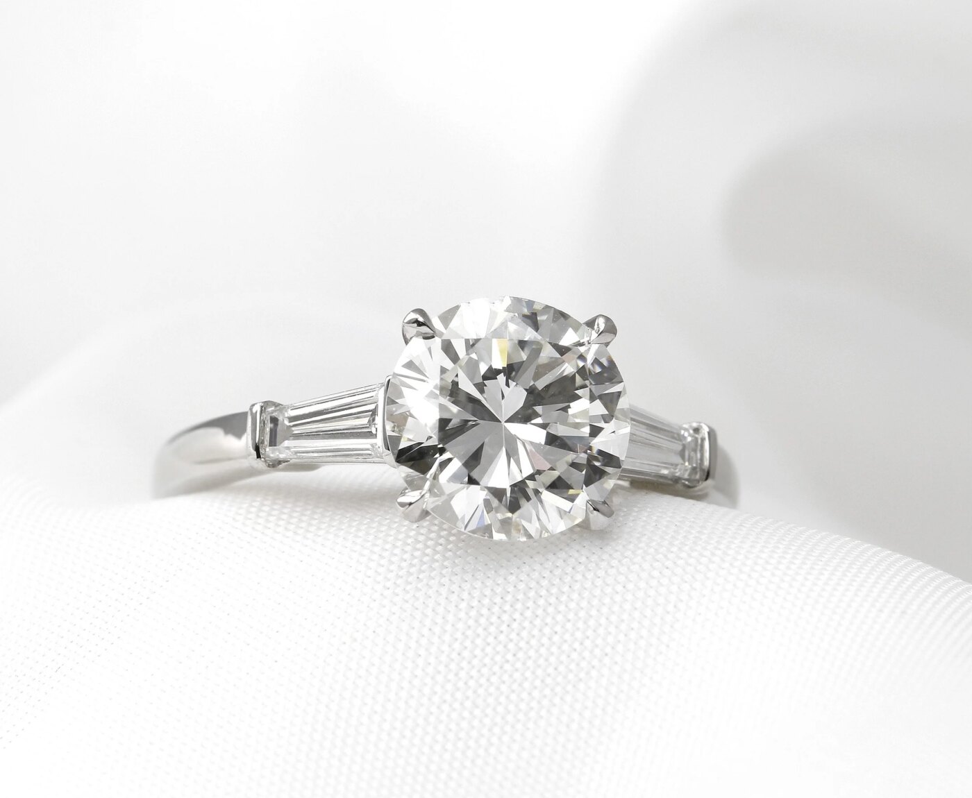 Diamond Solitaire Ring with Baguette Shoulders in Platinum