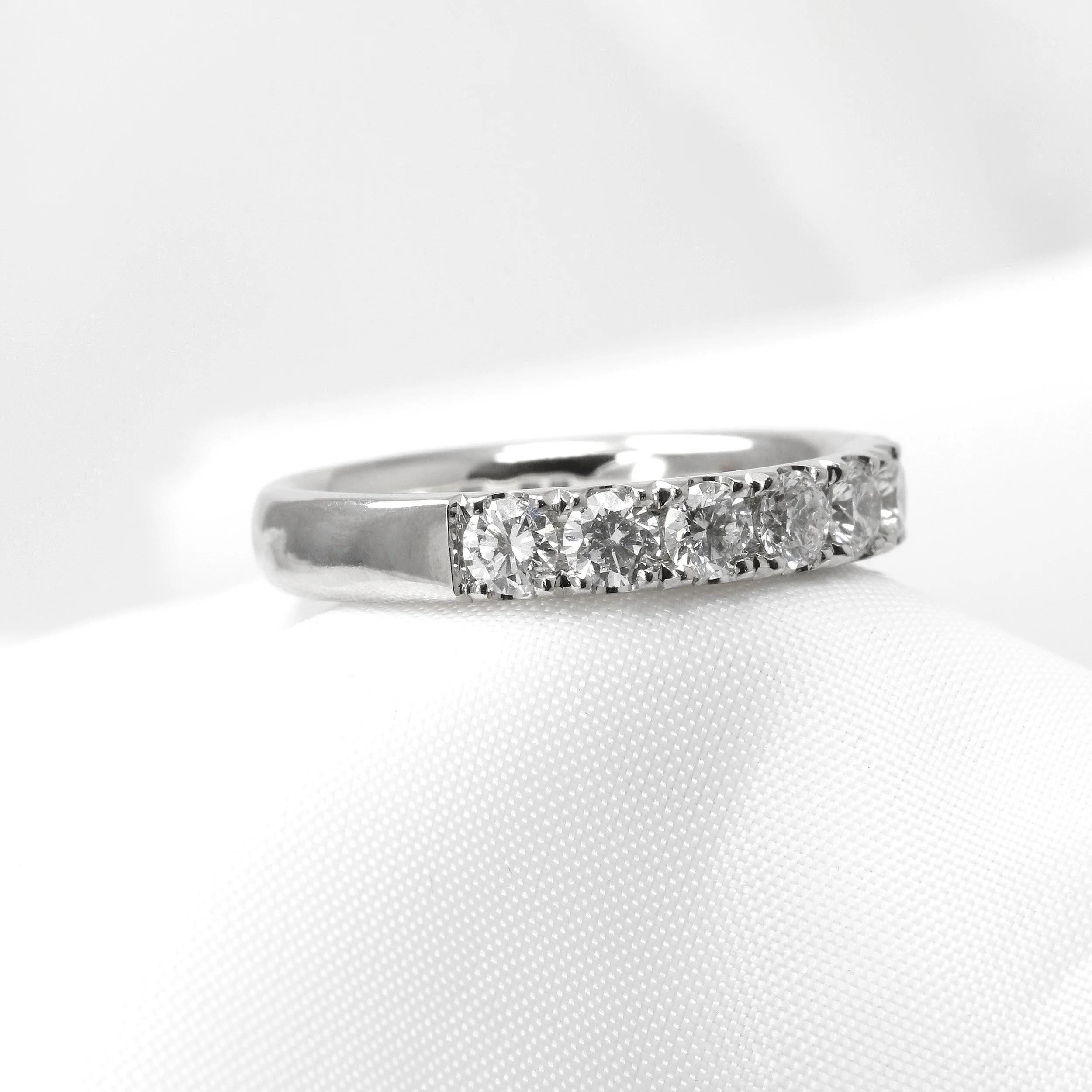 Cutaway Claw Set Diamond Half Eternity Ring in Platinum