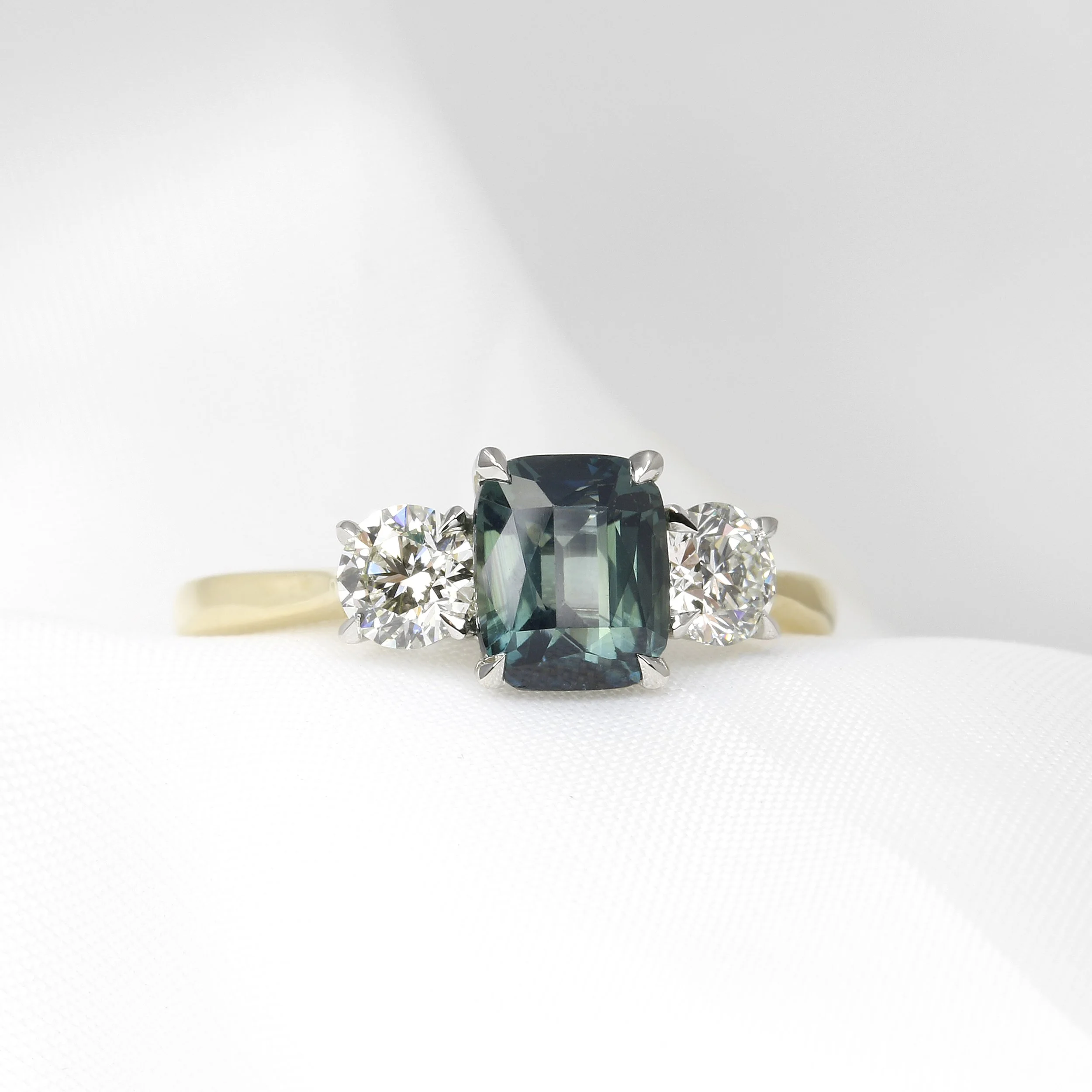 Teal Sapphire and Diamond Three Stone Ring
