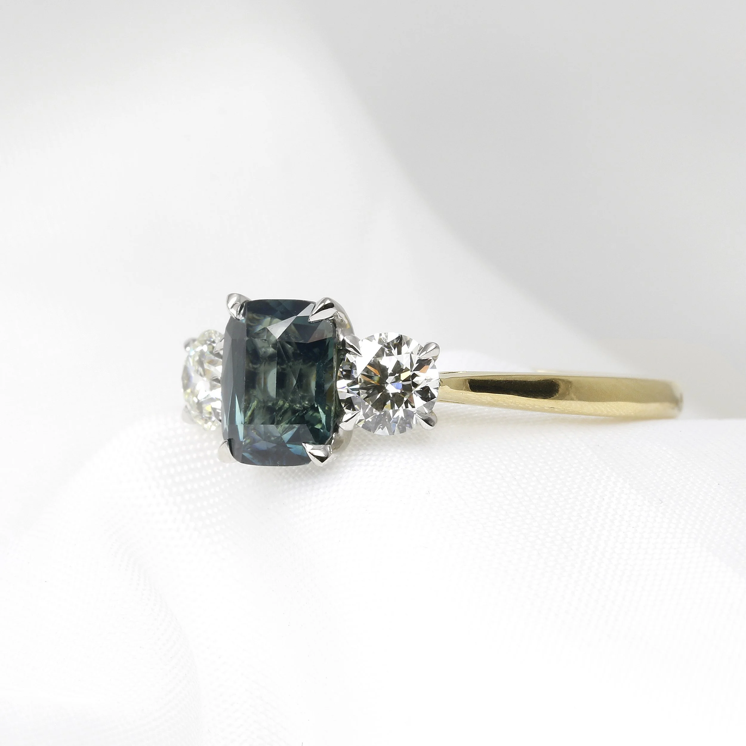 Teal Sapphire and Diamond Three Stone Ring