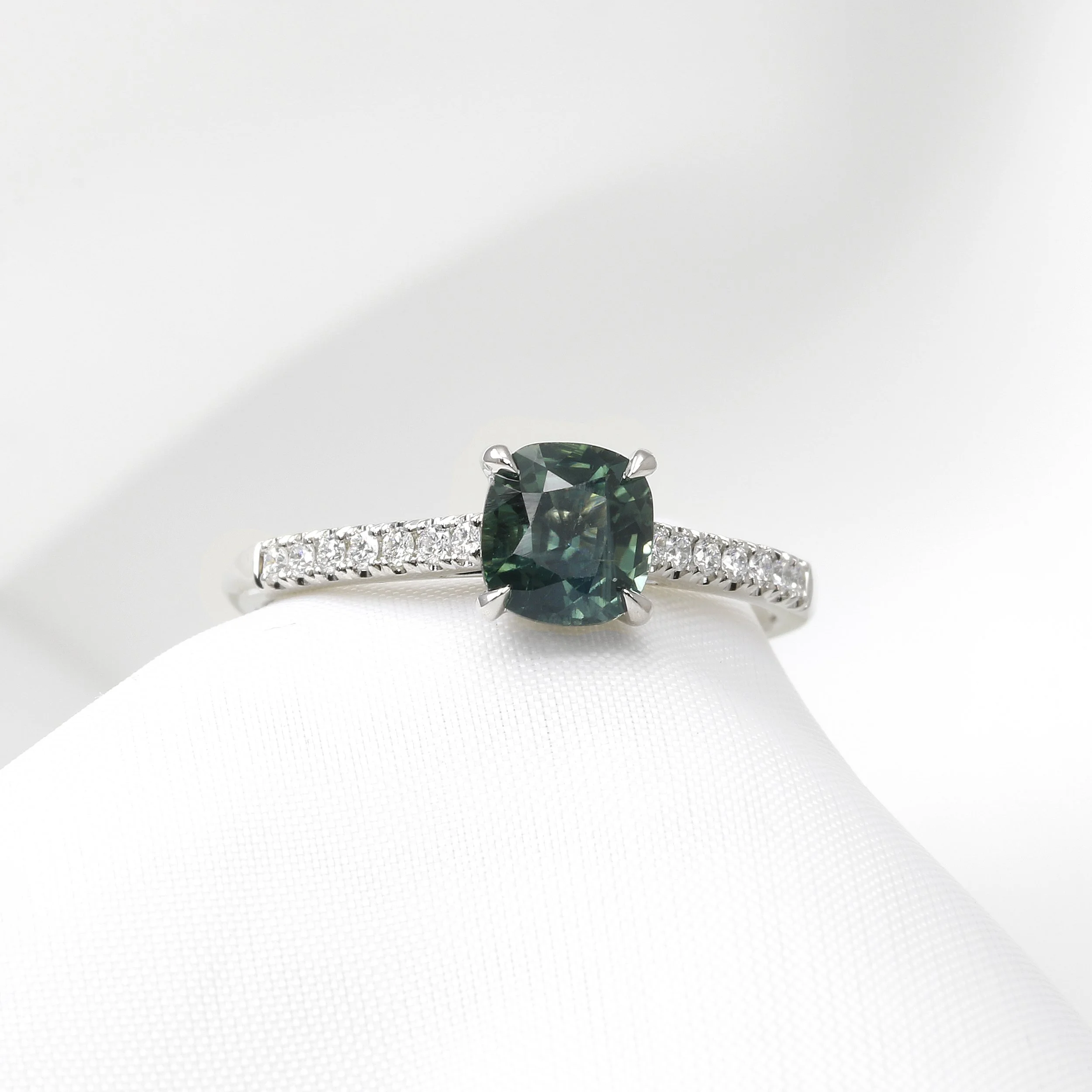 Teal Cushion Sapphire and Diamond Ring in Platinum