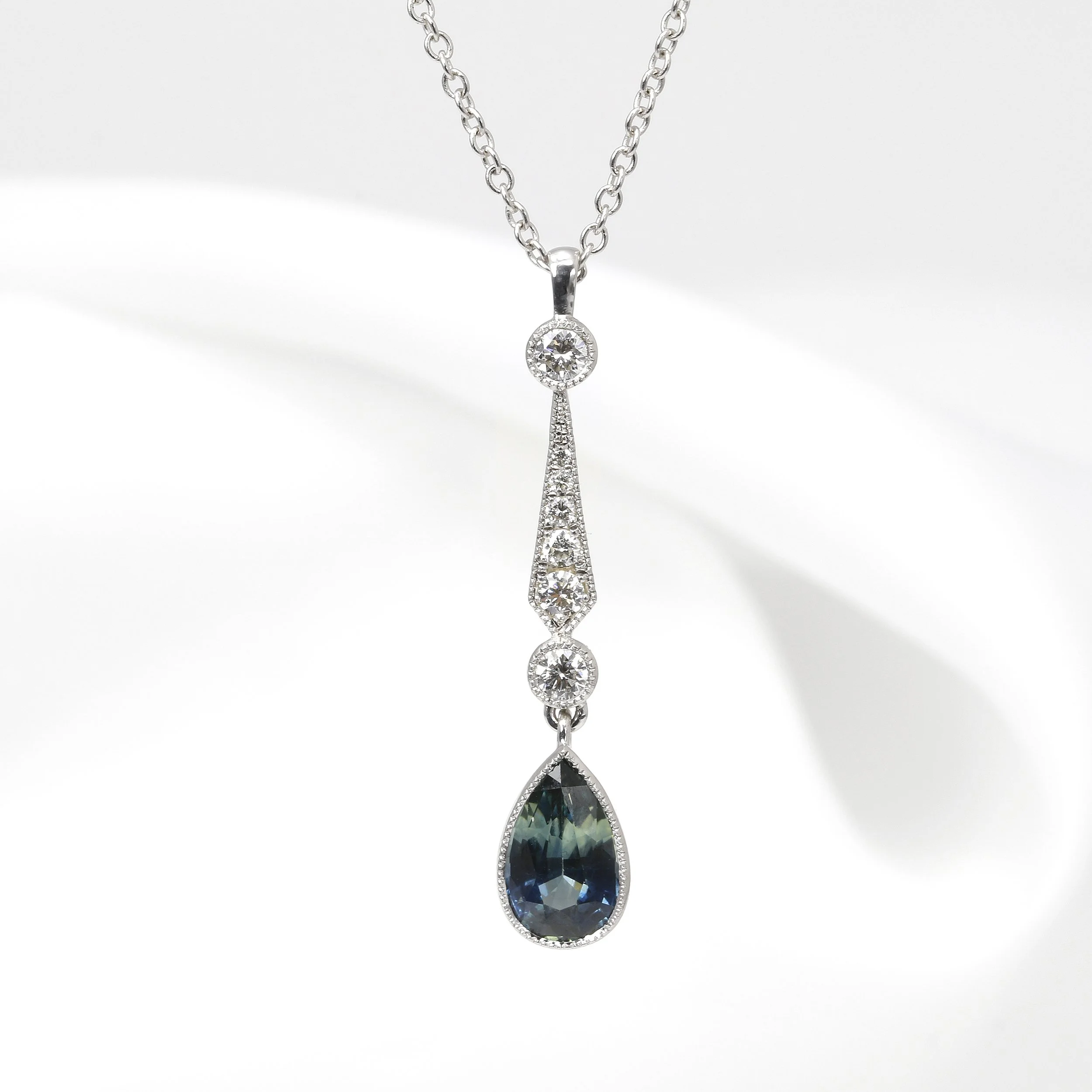 Teal Sapphire and Diamond Pendant in 9ct White Gold