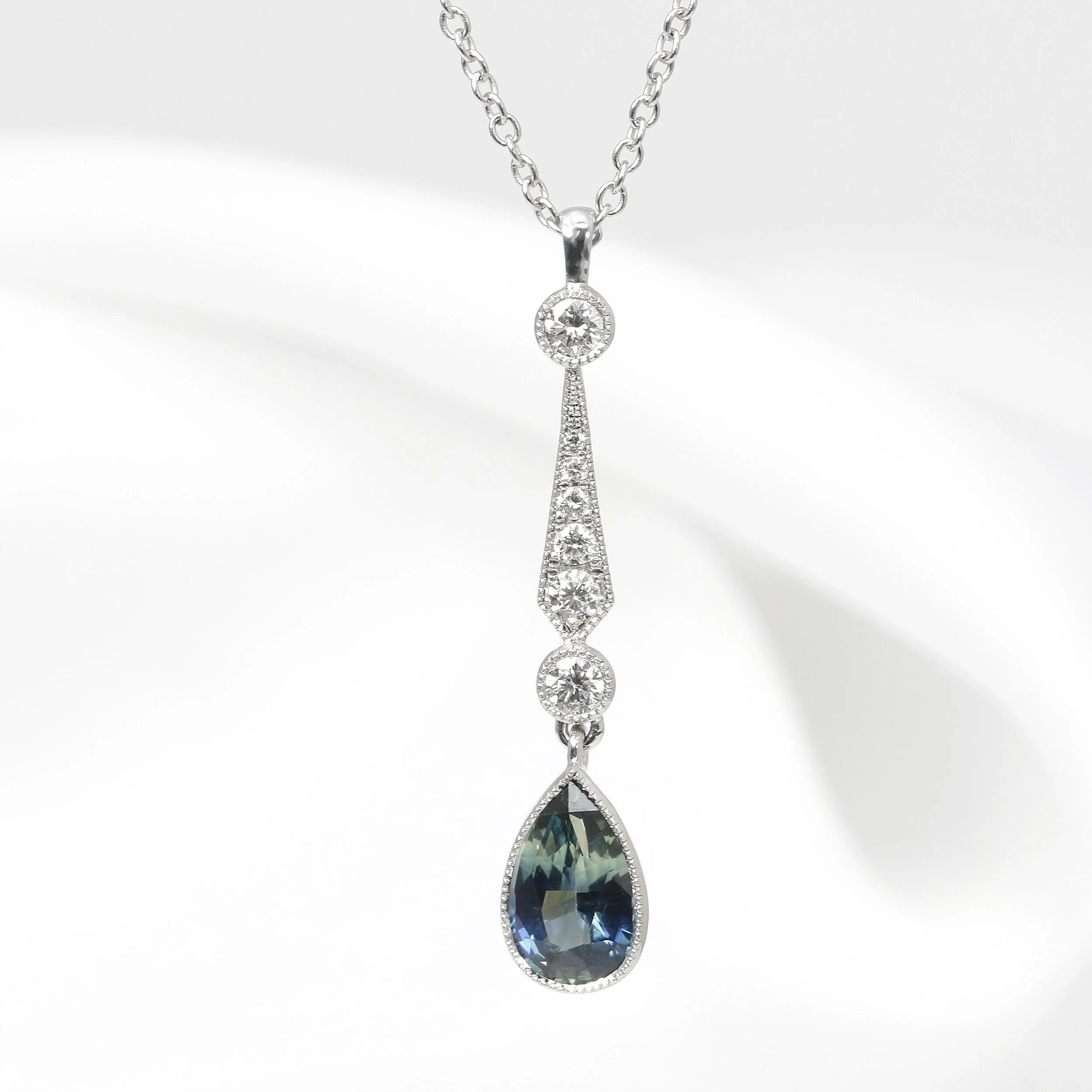 Teal Sapphire and Diamond Pendant in 9ct White Gold