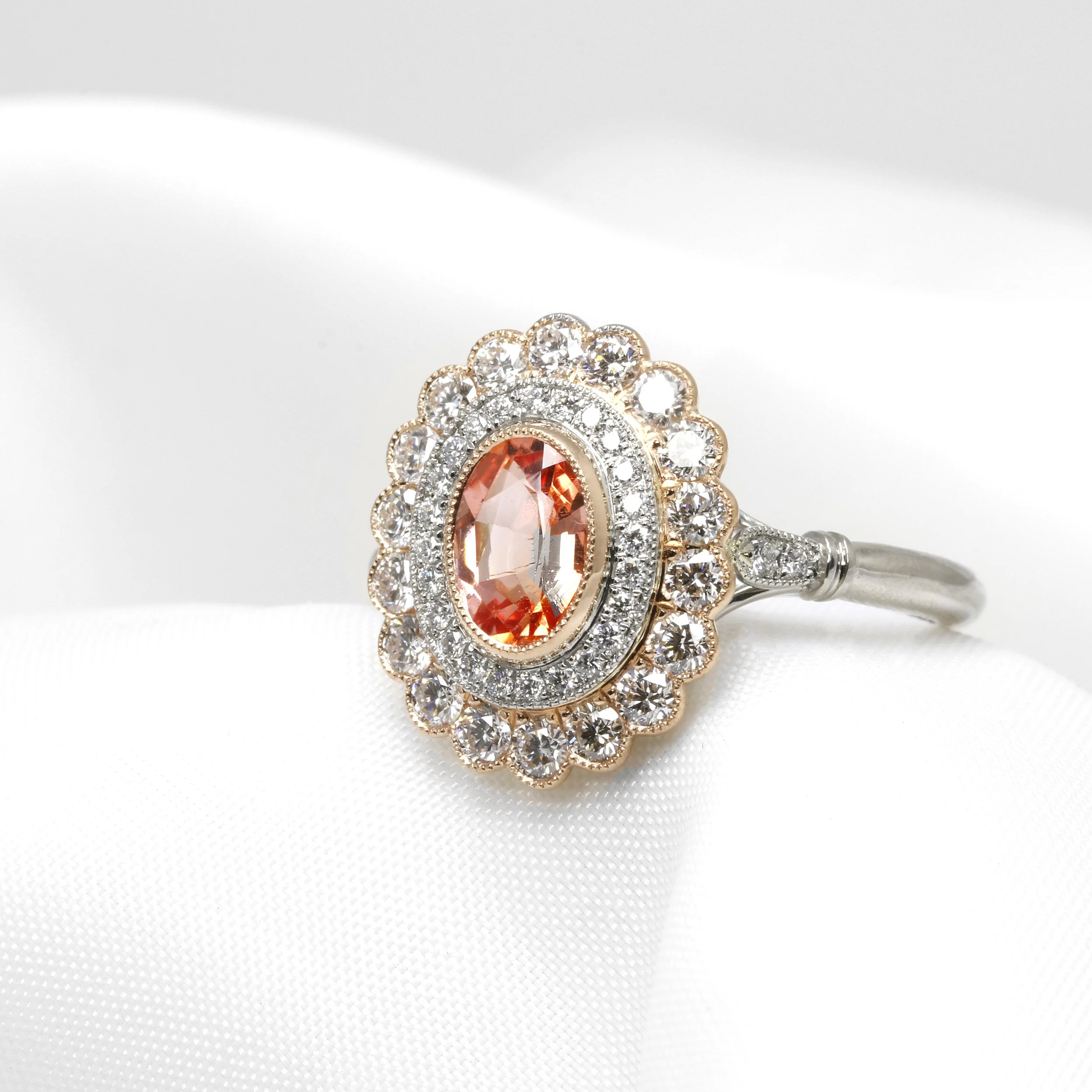 Padparadscha Sapphire and Diamond Cluster Ring