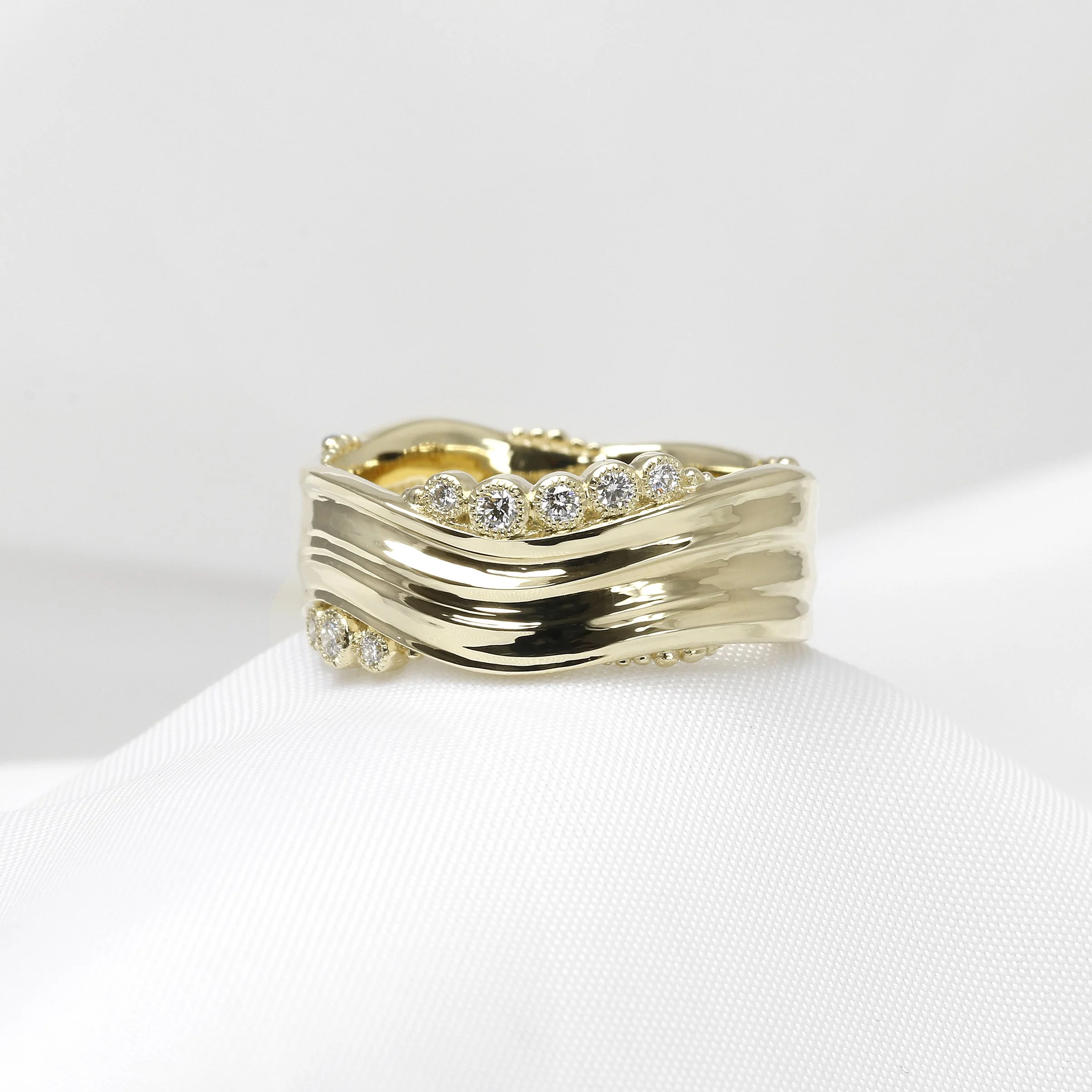 Diamond Set Wide Band ‘Wave’ Ring in Yellow Gold