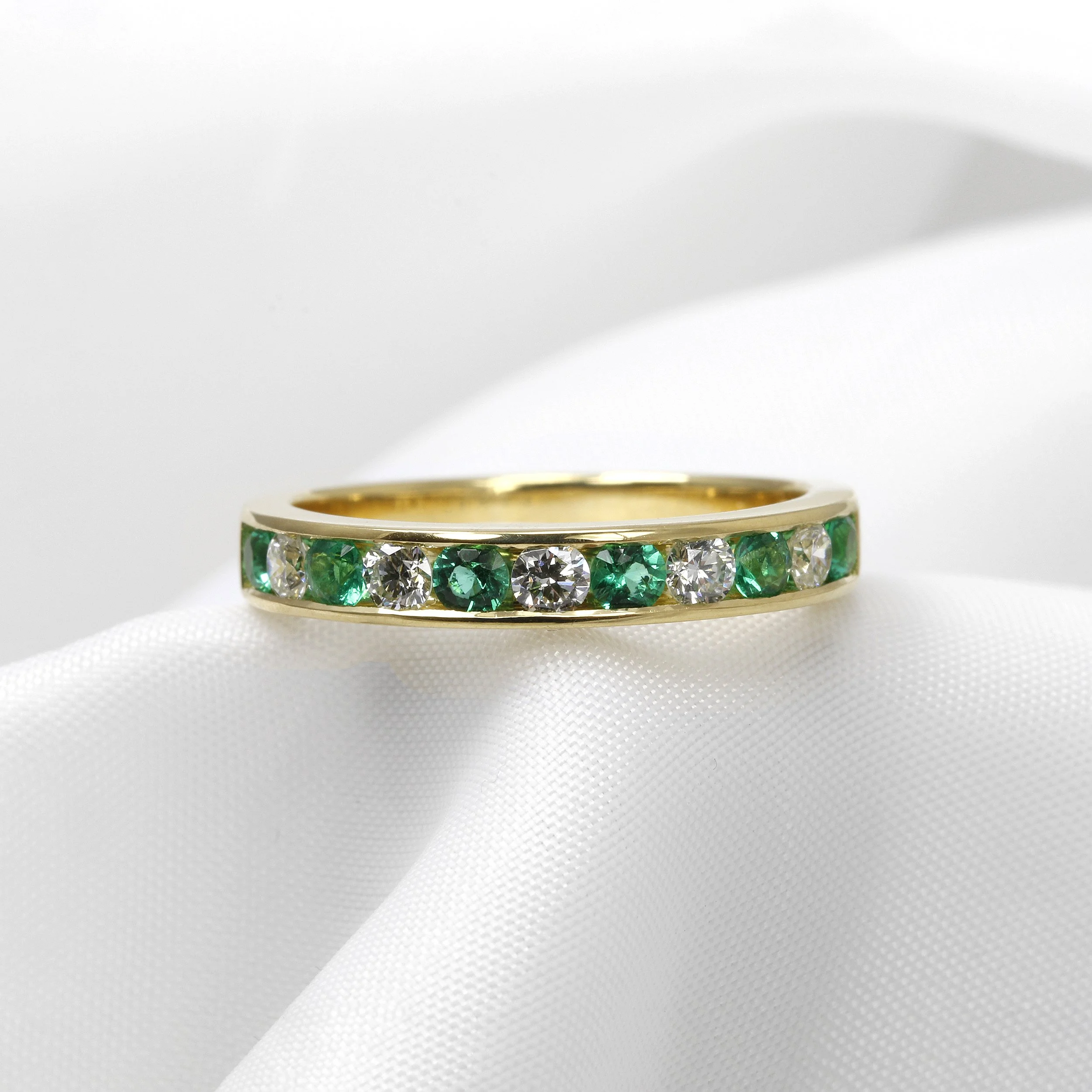 Emerald and Diamond Eternity Ring in 18ct Yellow Gold