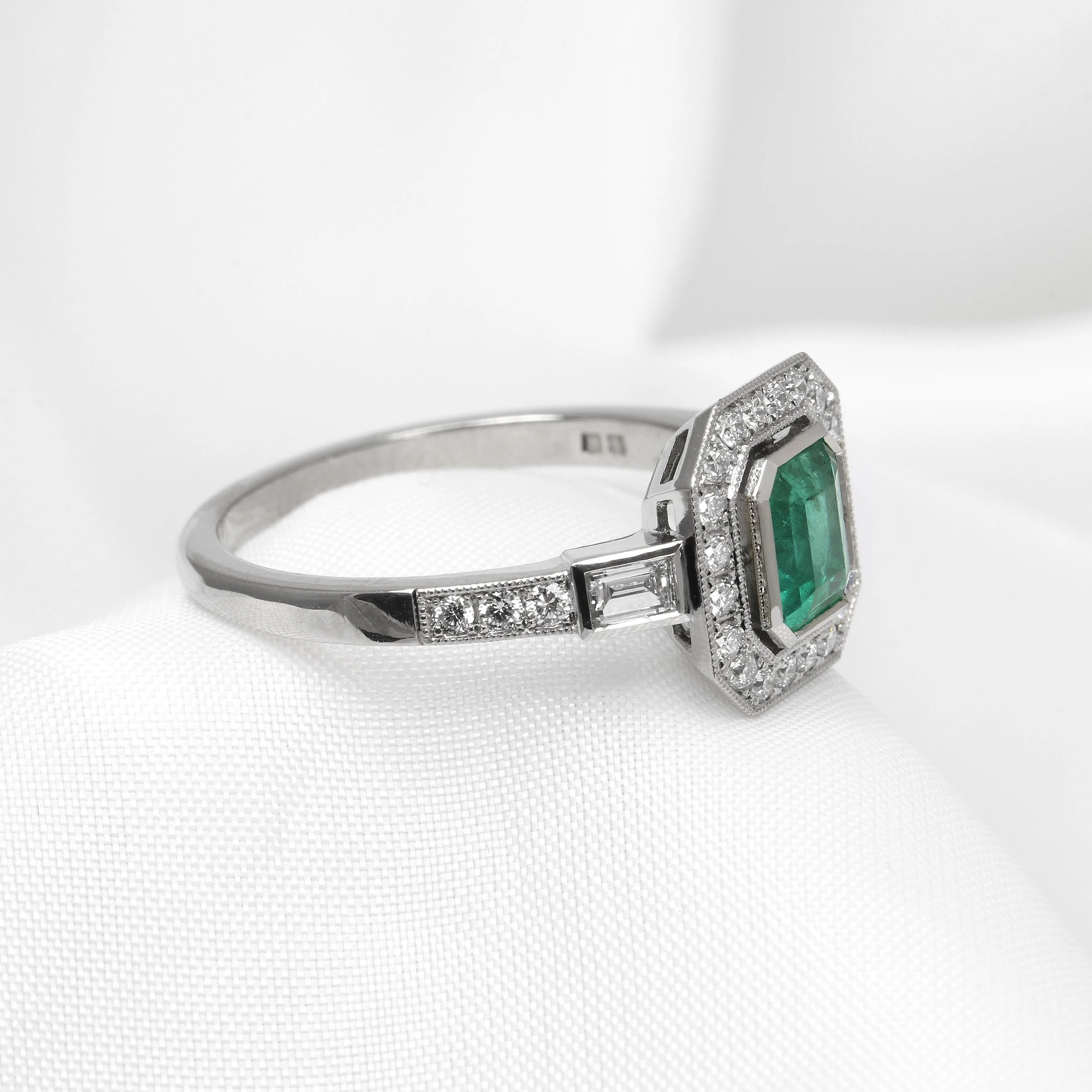 Emerald and Diamond Halo Ring in Platinum