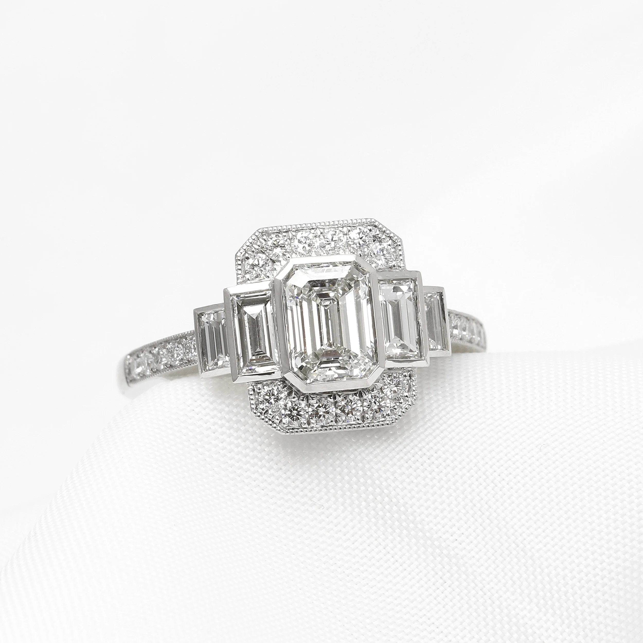 Emerald Cut Diamond Cluster Ring in Platinum