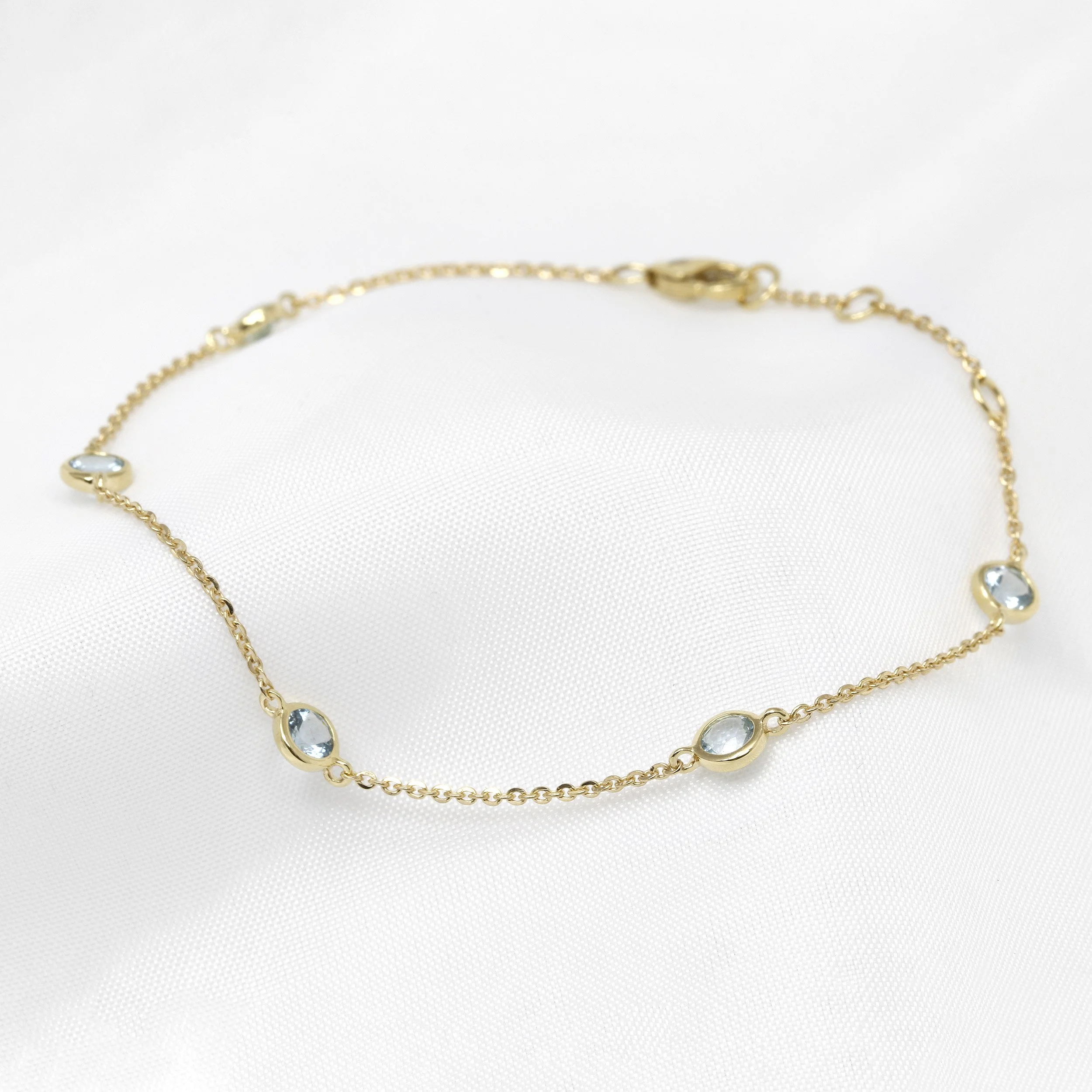 Aquamarine Station Bracelet in Yellow Gold