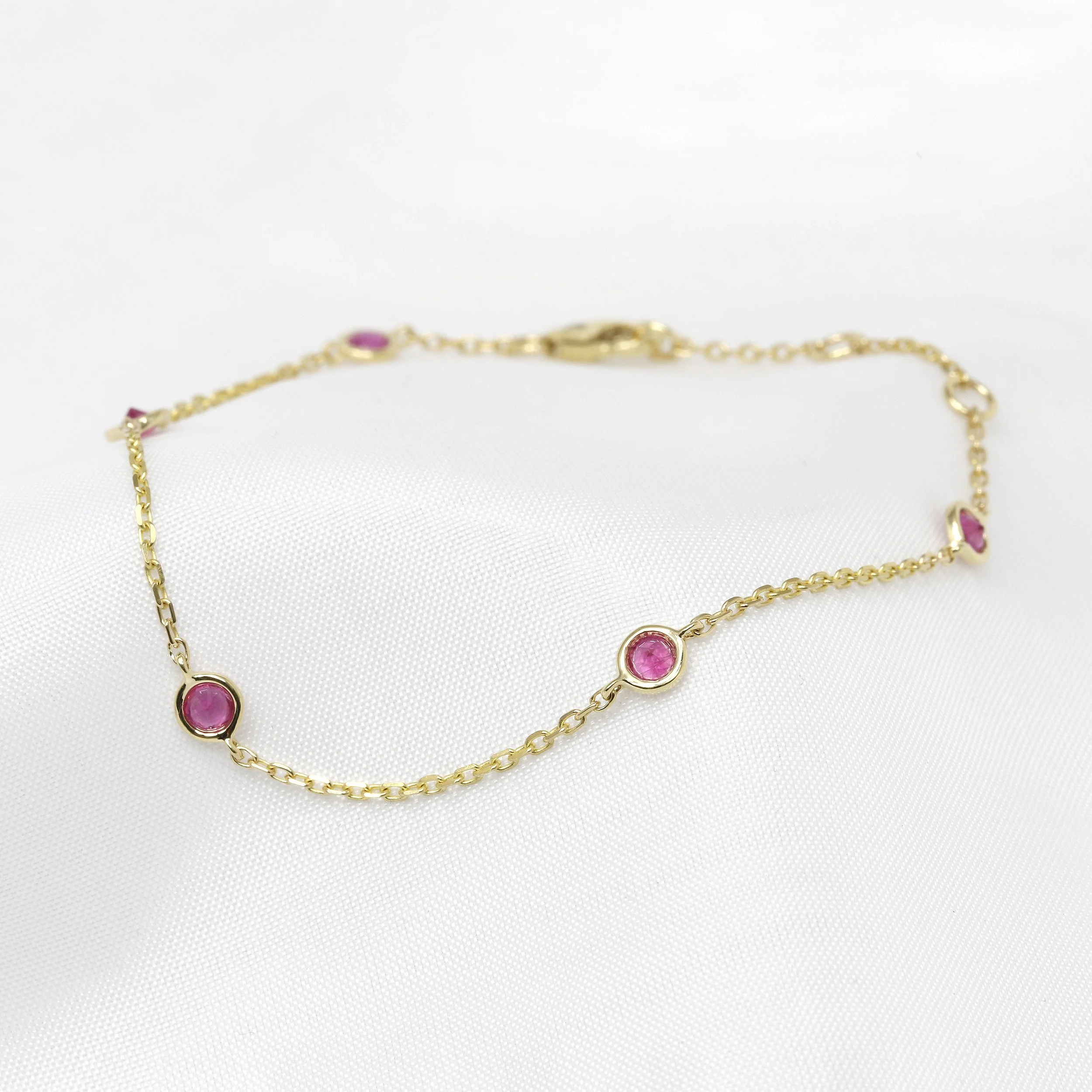 Pink Sapphire Station Bracelet in Yellow Gold