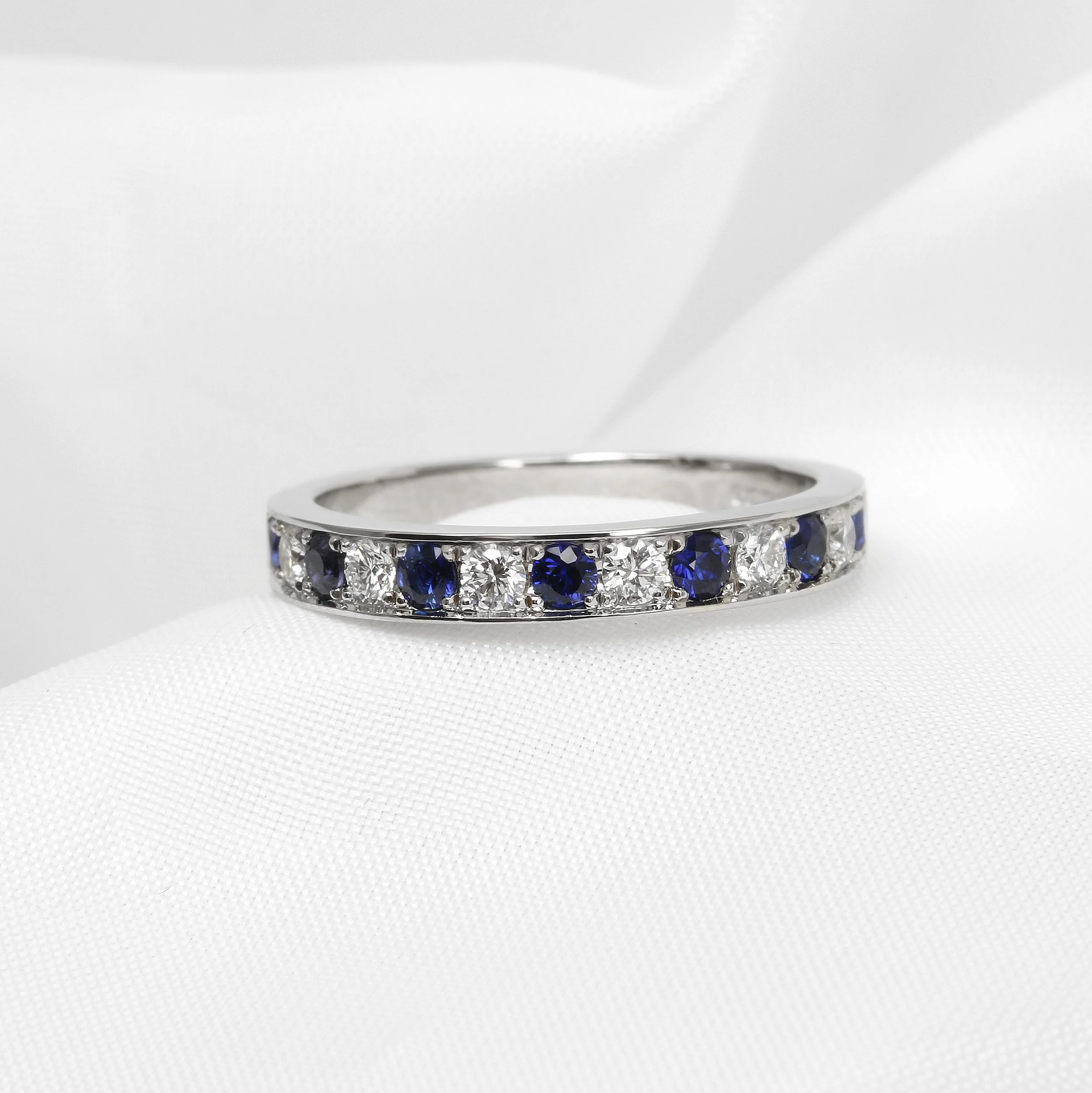 Grain Set Sapphire and Diamond Eternity Ring in Platinum