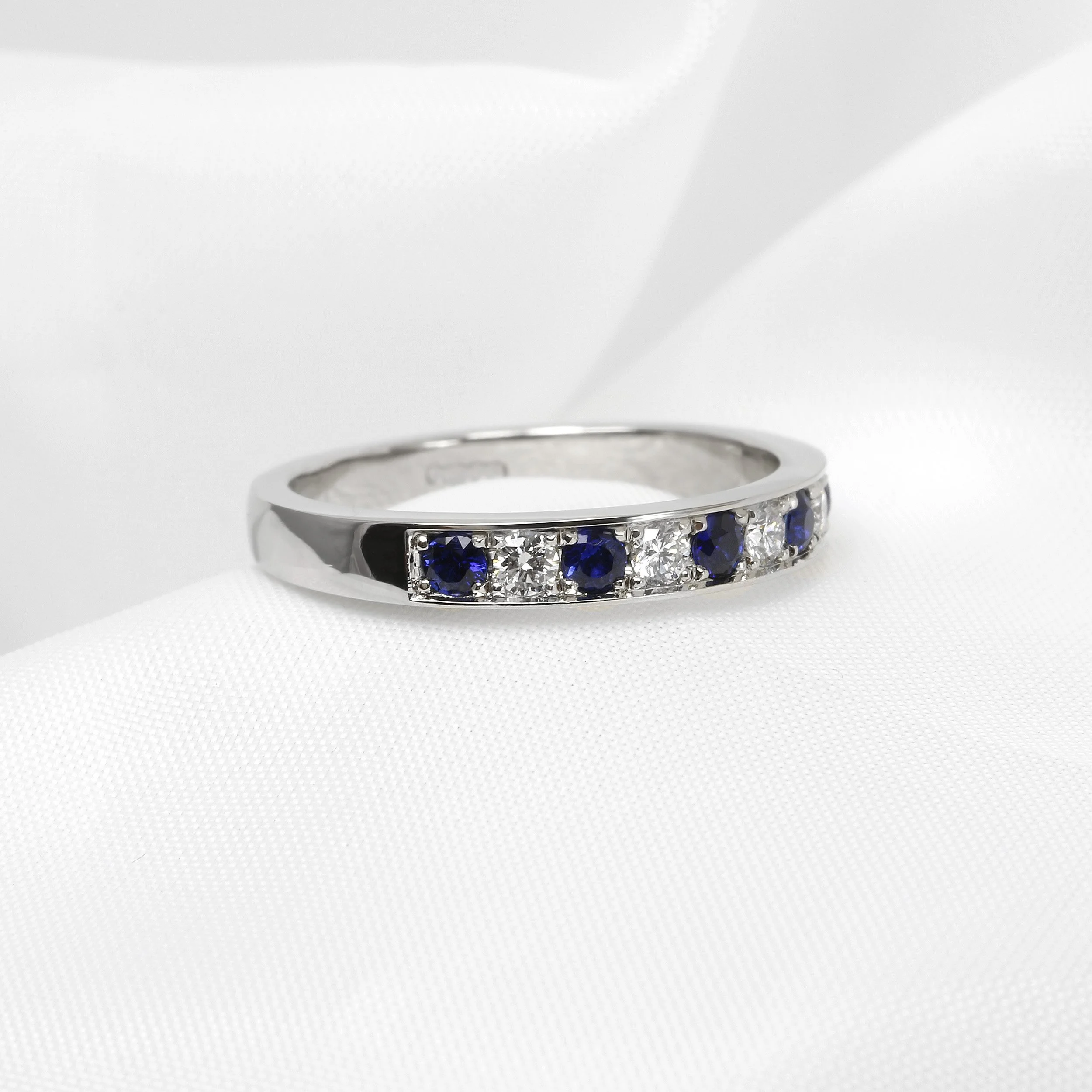 Grain Set Sapphire and Diamond Eternity Ring in Platinum