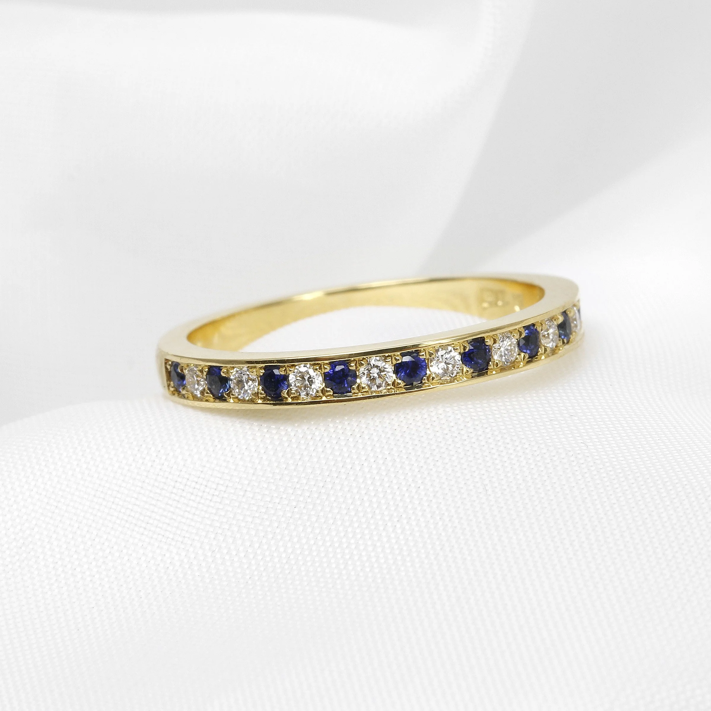 Grain Set Sapphire and Diamond Eternity Ring in Yellow Gold