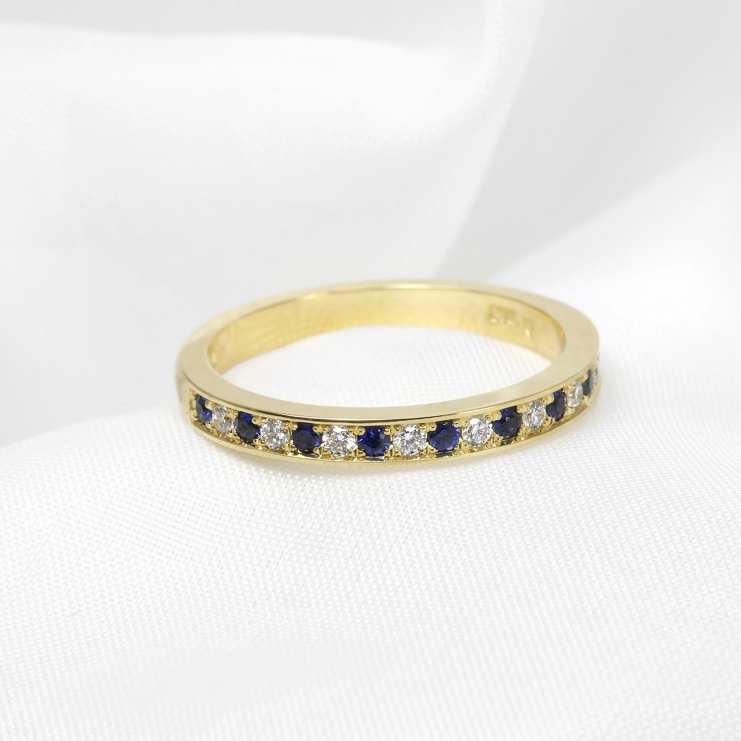 Grain Set Sapphire and Diamond Eternity Ring in Yellow Gold