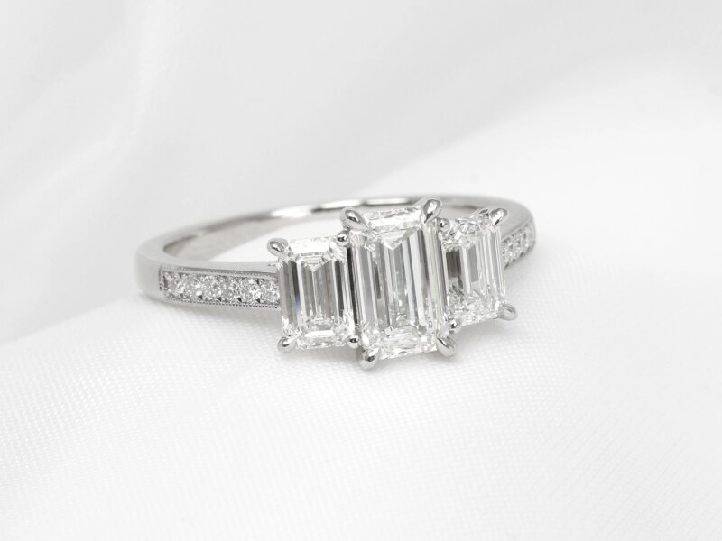 Emerald Cut Three Stone Ring in Platinum