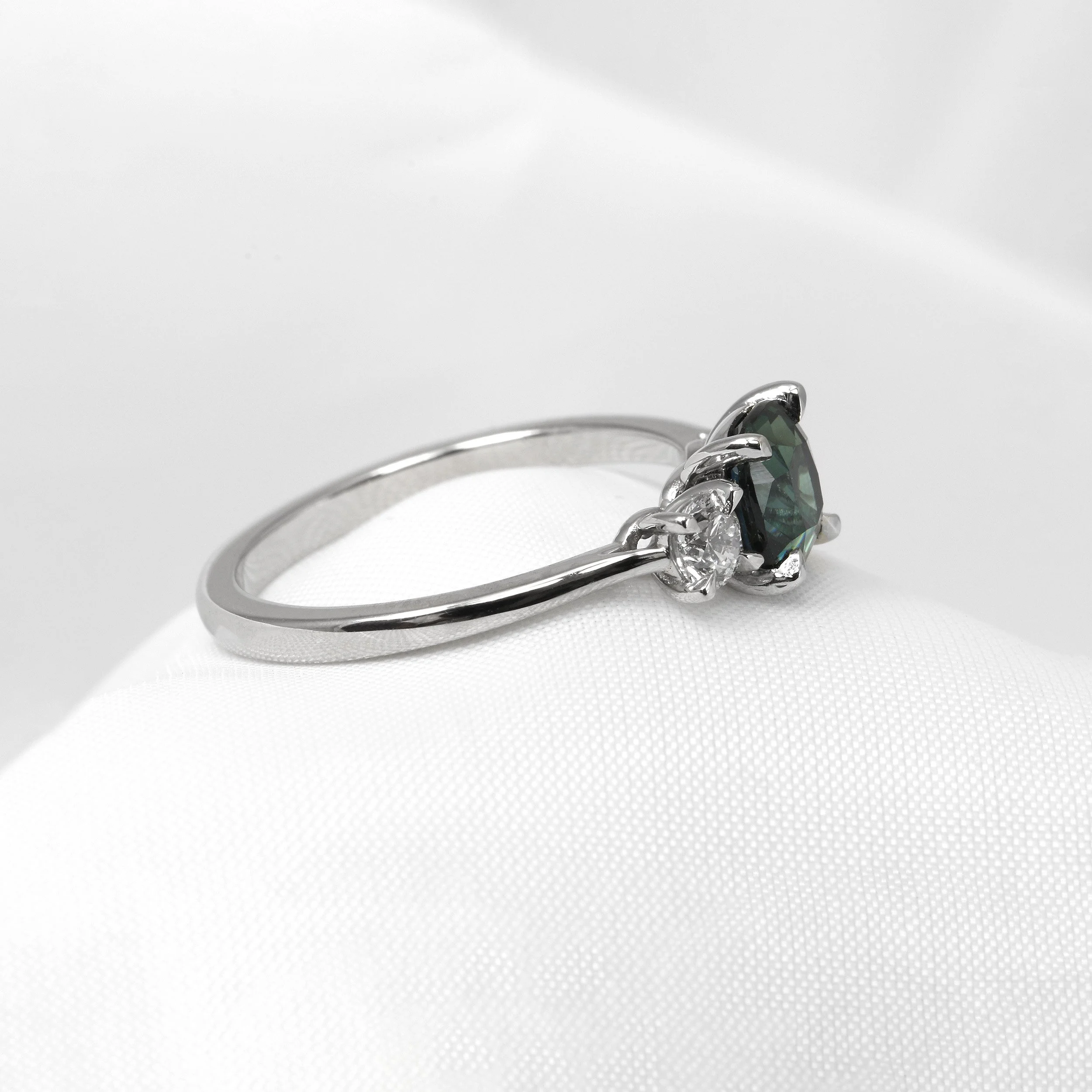 Teal Sapphire And Diamond Three Stone Ring in Platinum