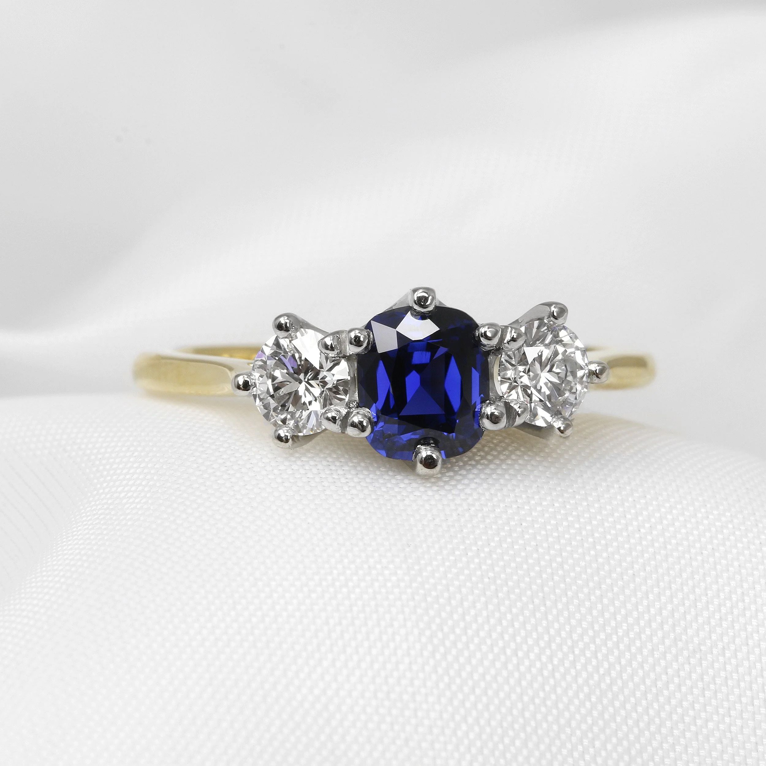 Sapphire and Diamond Three Stone Ring in Platinum and Yellow Gold