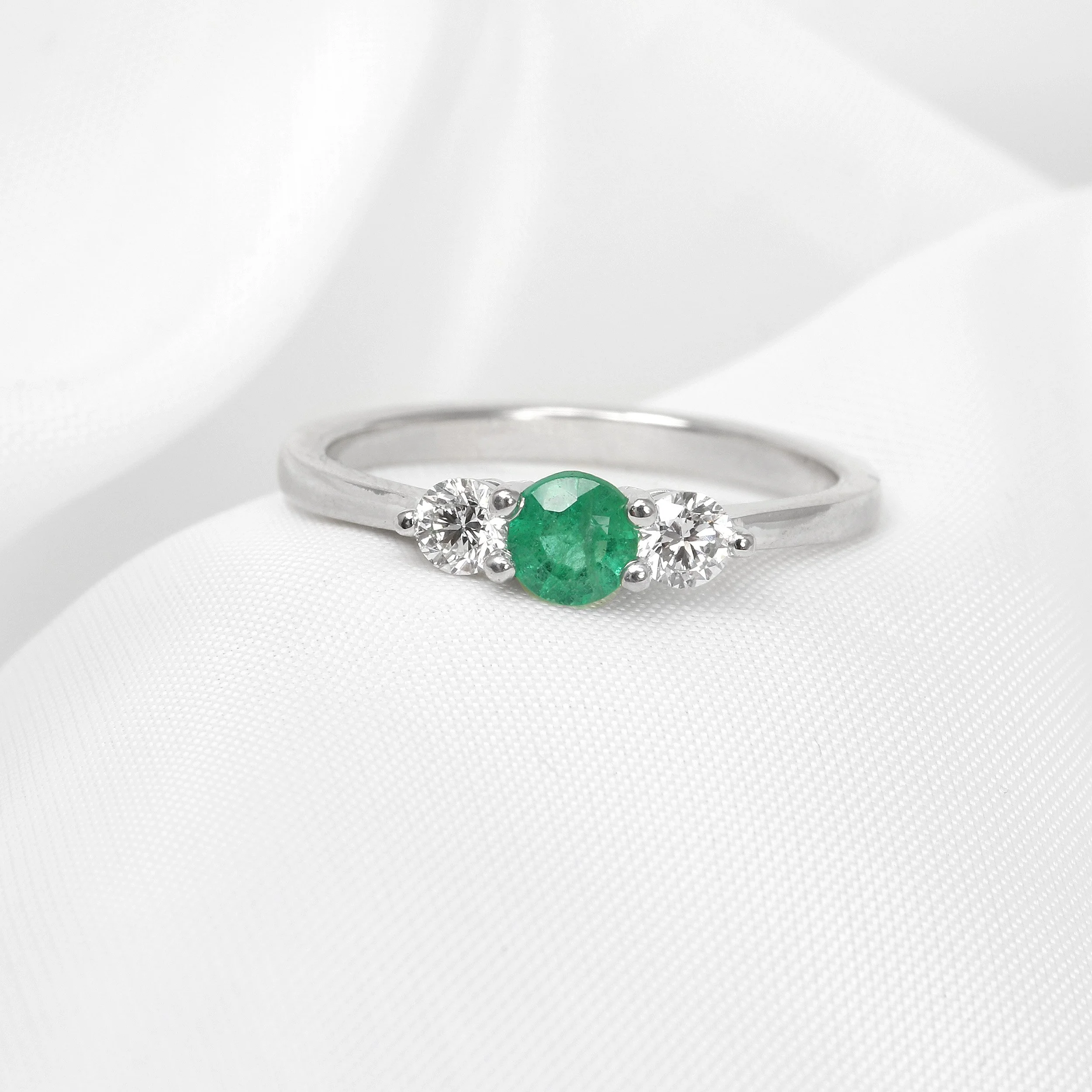 Emerald and Diamond Three Stone Ring in Platinum