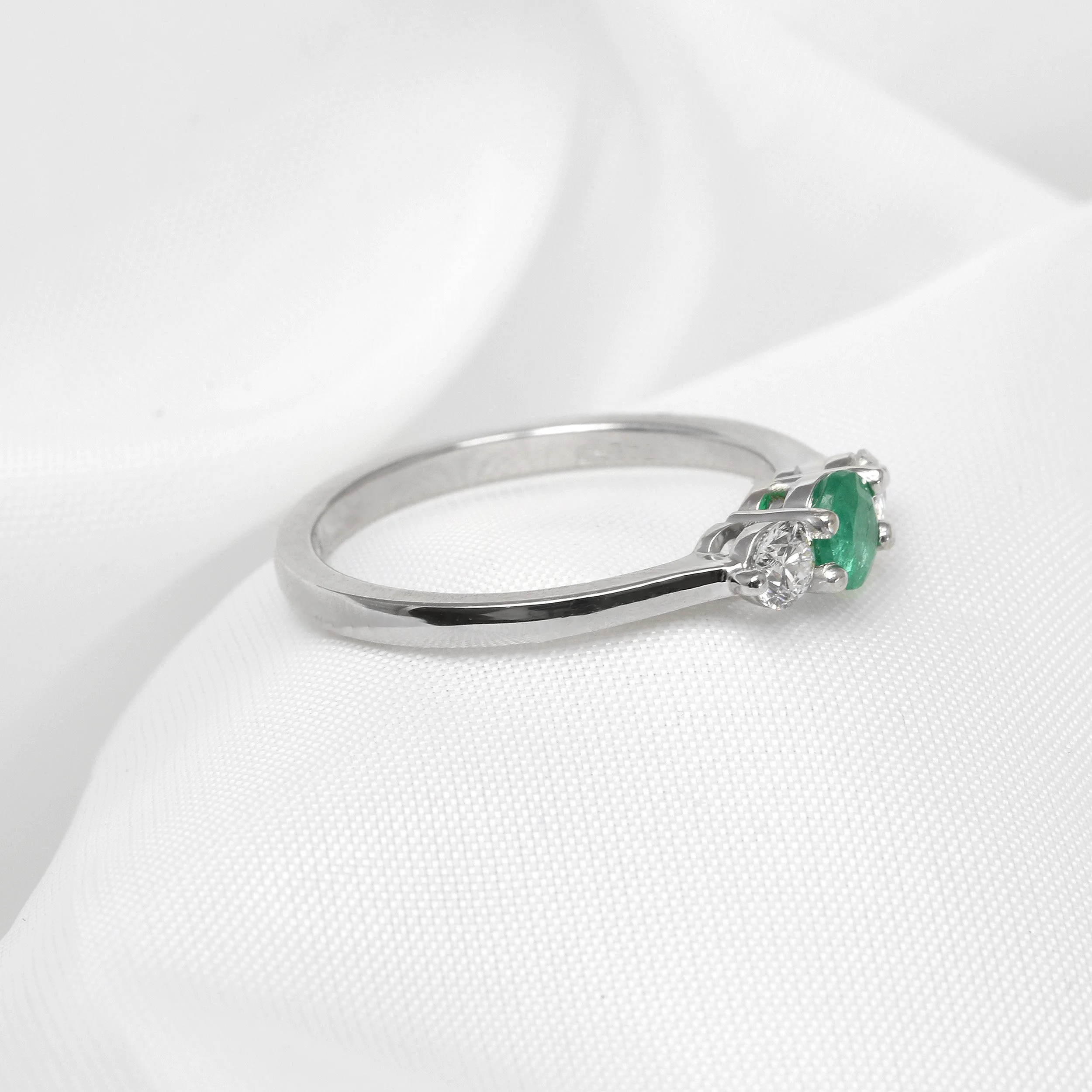 Emerald and Diamond Three Stone Ring in Platinum