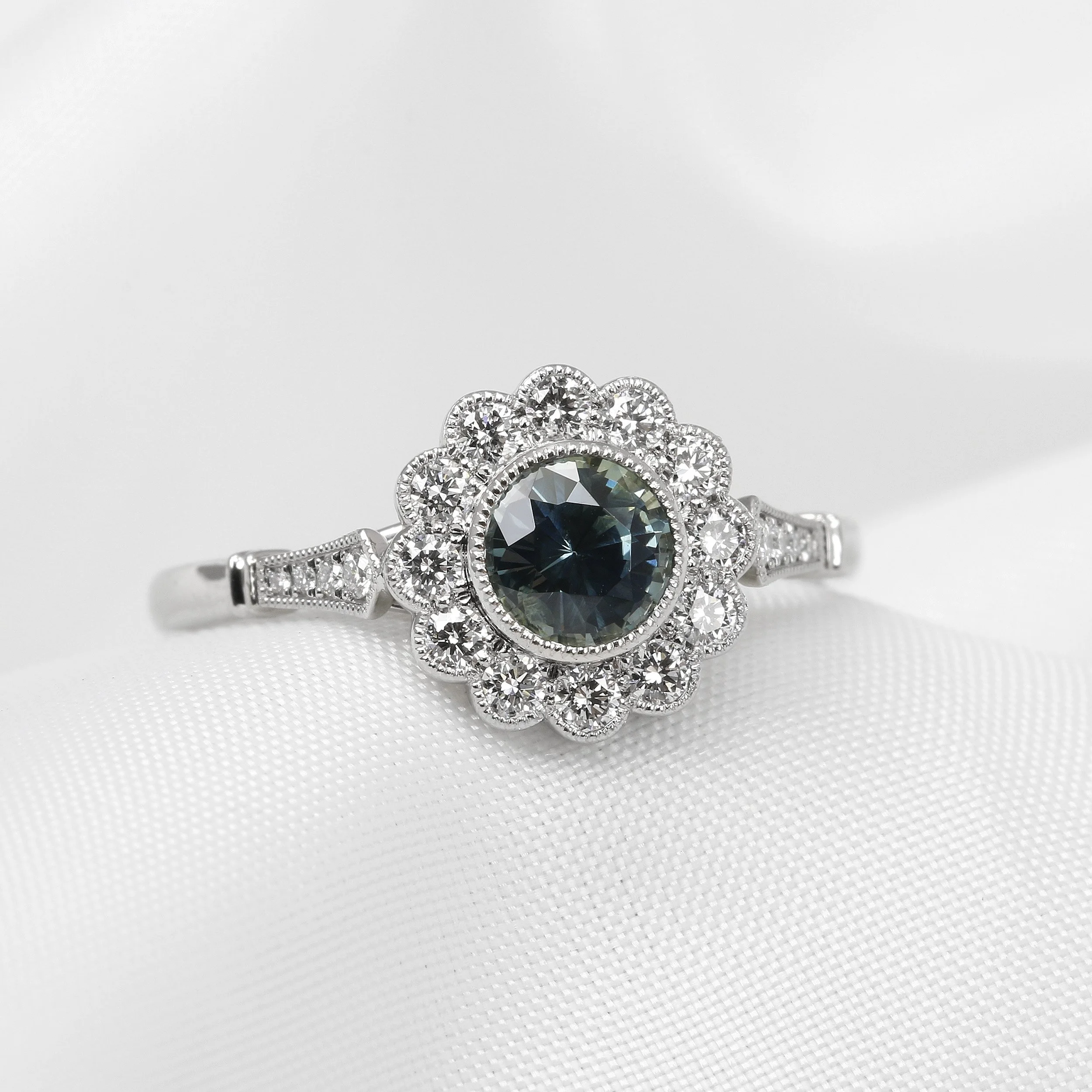 Teal Sapphire and Diamond Daisy Cluster Ring in Platinum