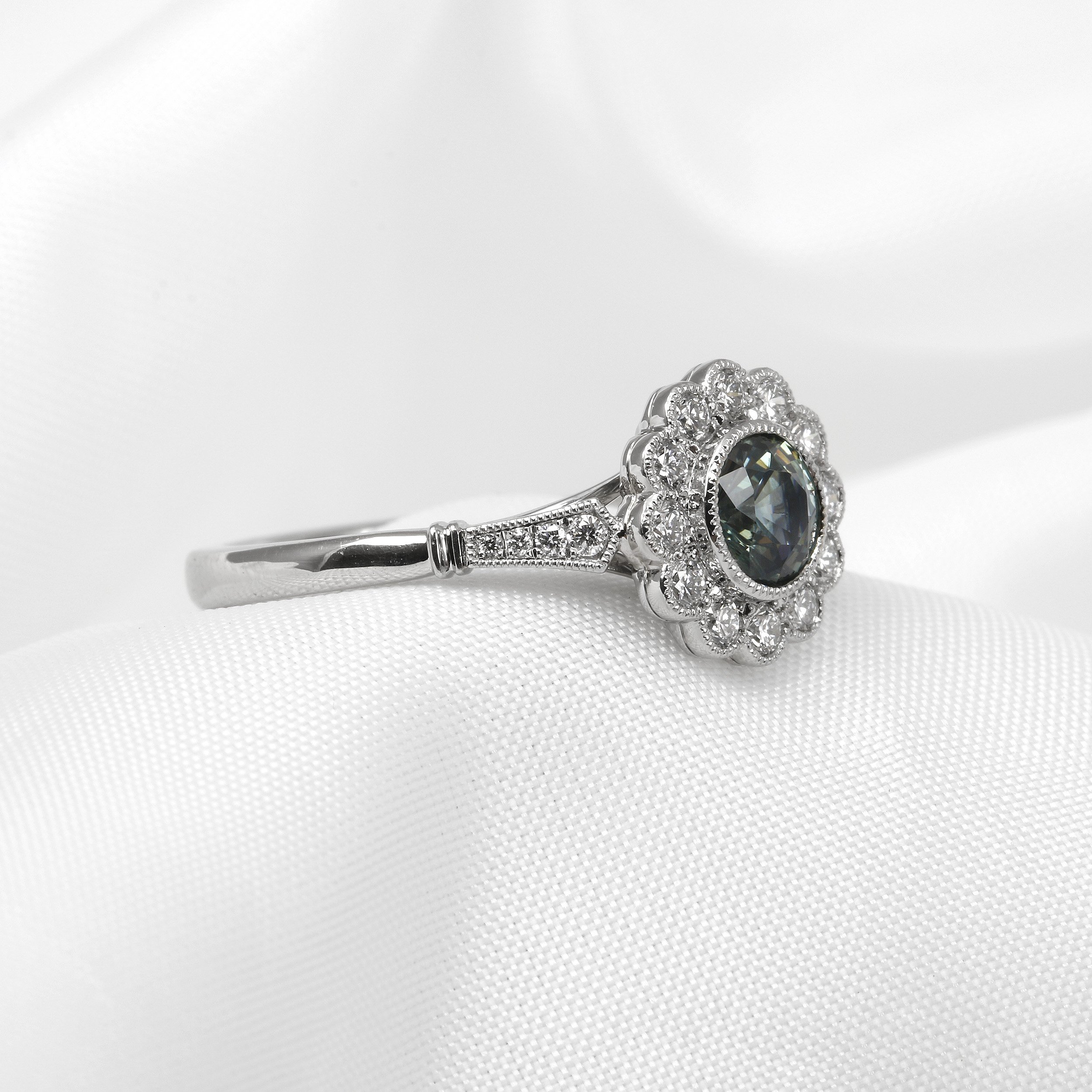 Teal Sapphire and Diamond Daisy Cluster Ring in Platinum