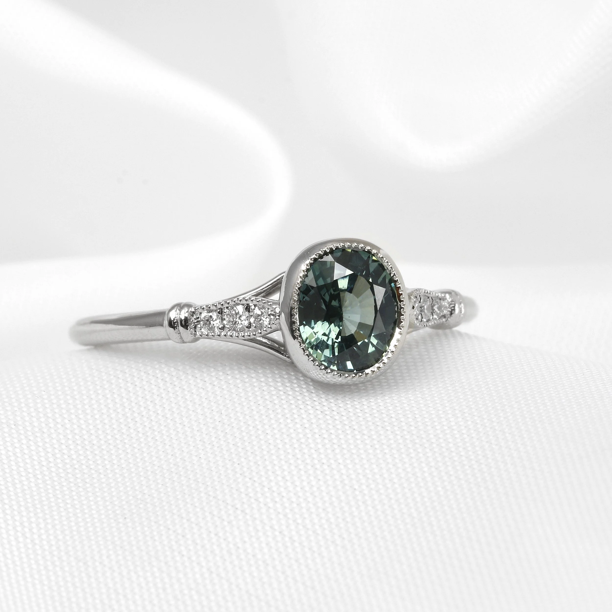 Teal Sapphire and Diamond Ring in Platinum
