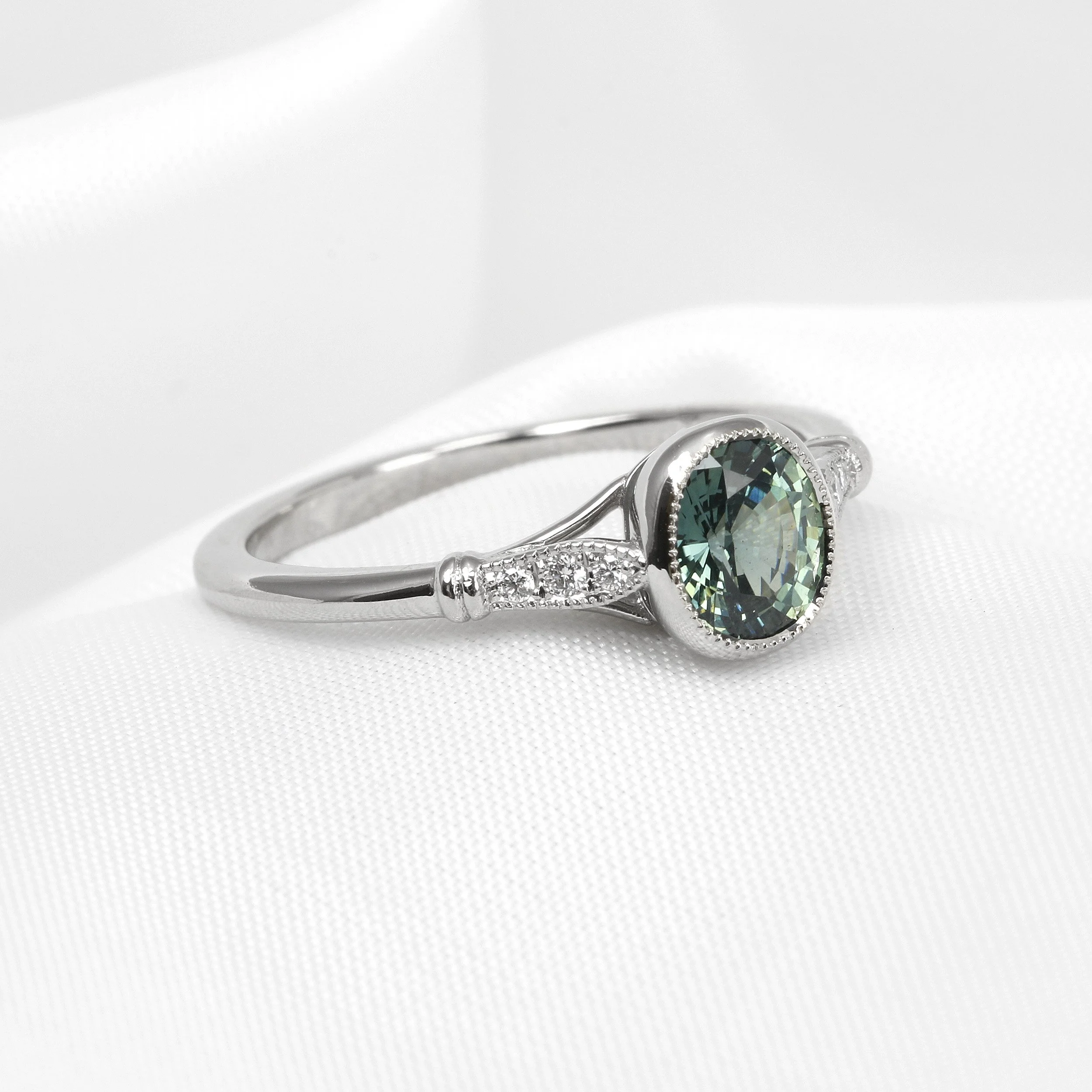 Teal Sapphire and Diamond Ring in Platinum