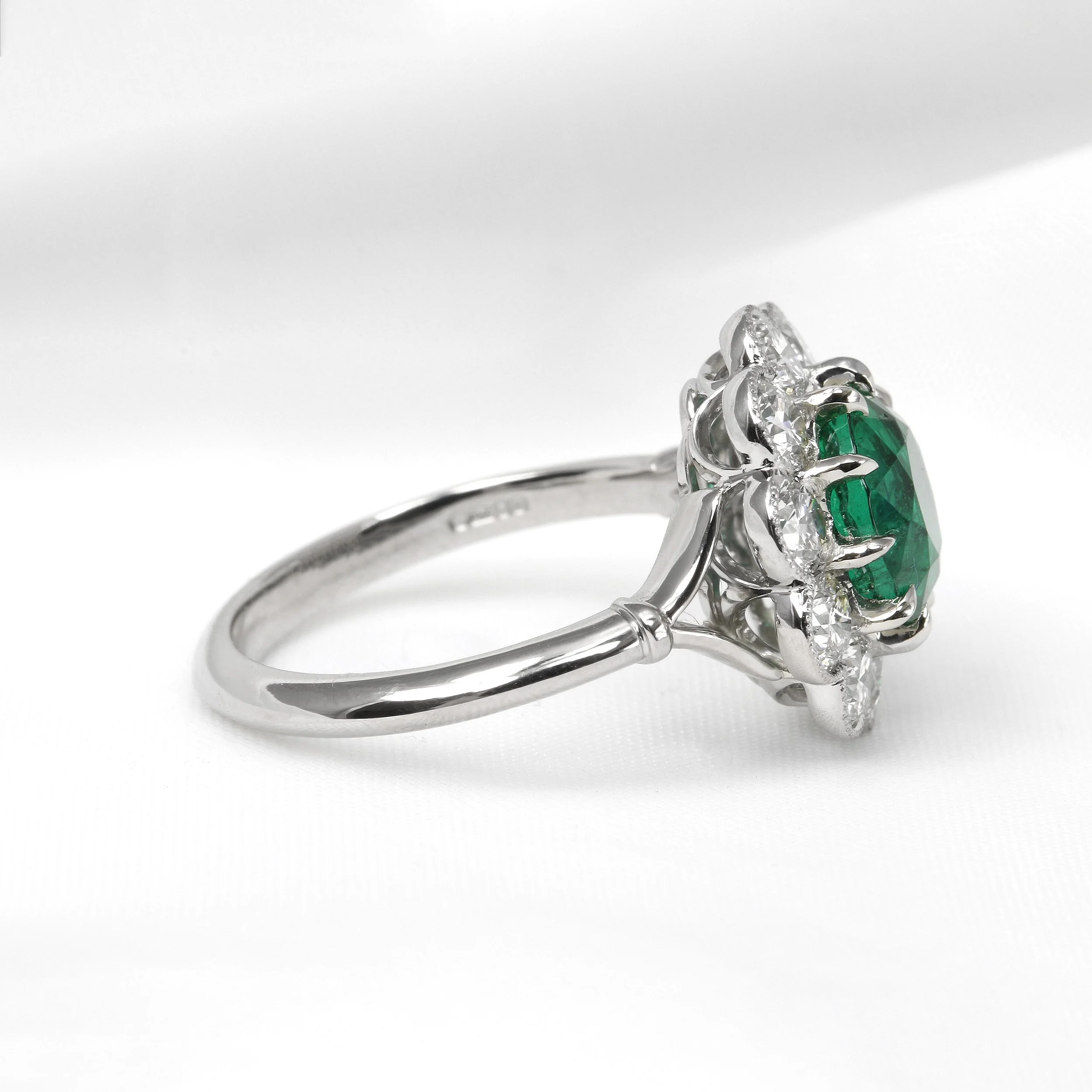 Emerald and Diamond Daisy Cluster Ring in Platinum