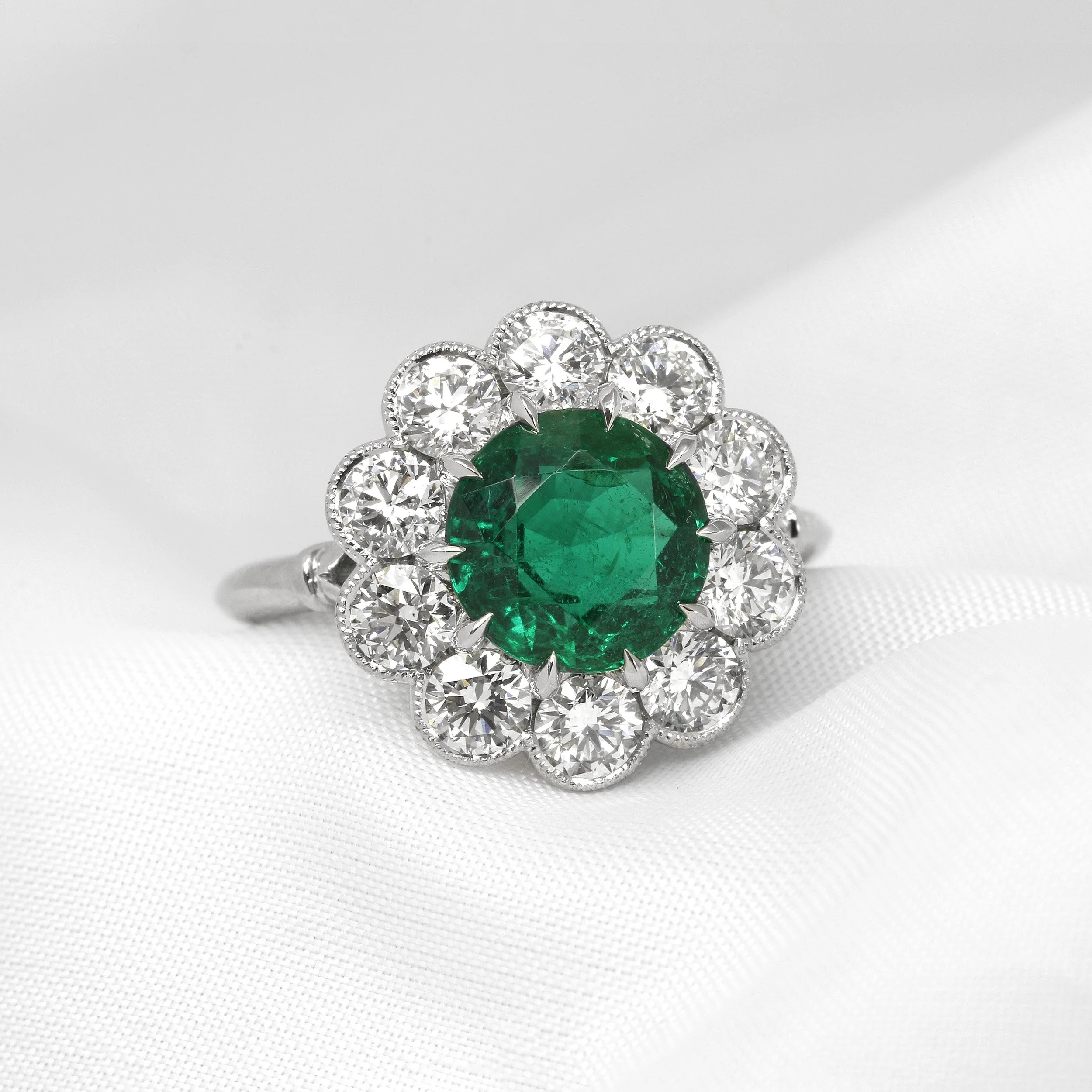 Emerald and Diamond Daisy Cluster Ring in Platinum