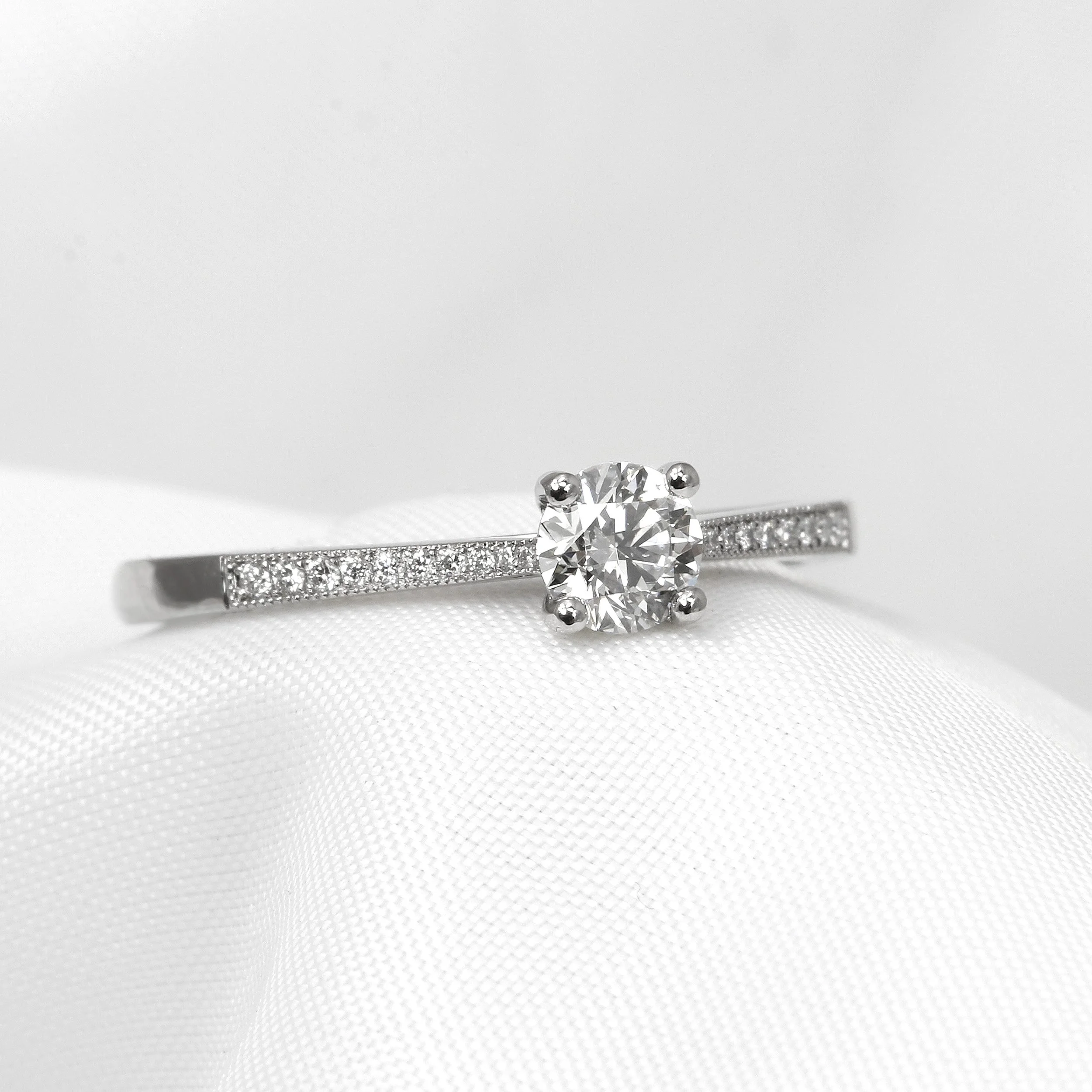 Diamond Solitaire Ring with Stone Set Shoulders in Platinum