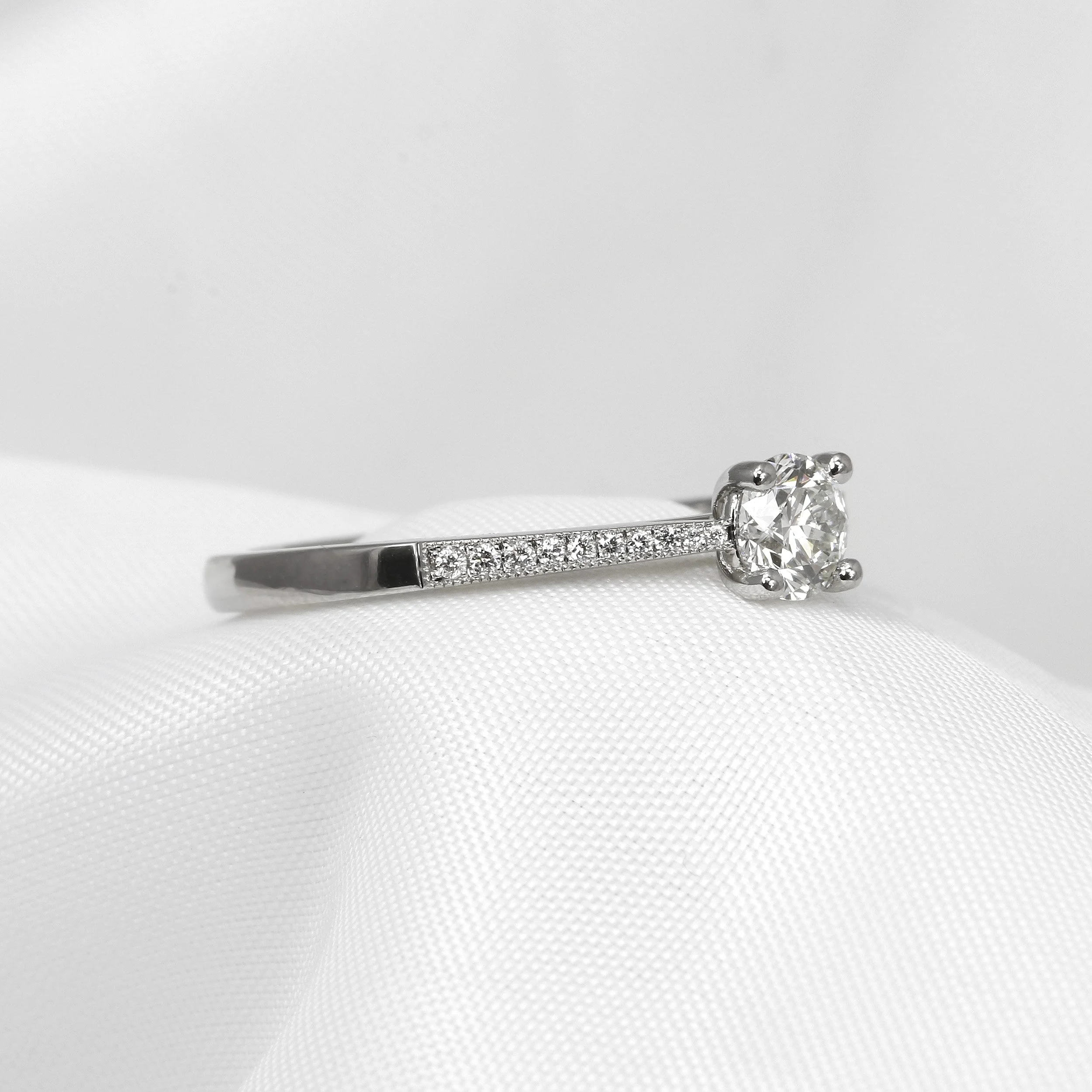 Diamond Solitaire Ring with Stone Set Shoulders in Platinum