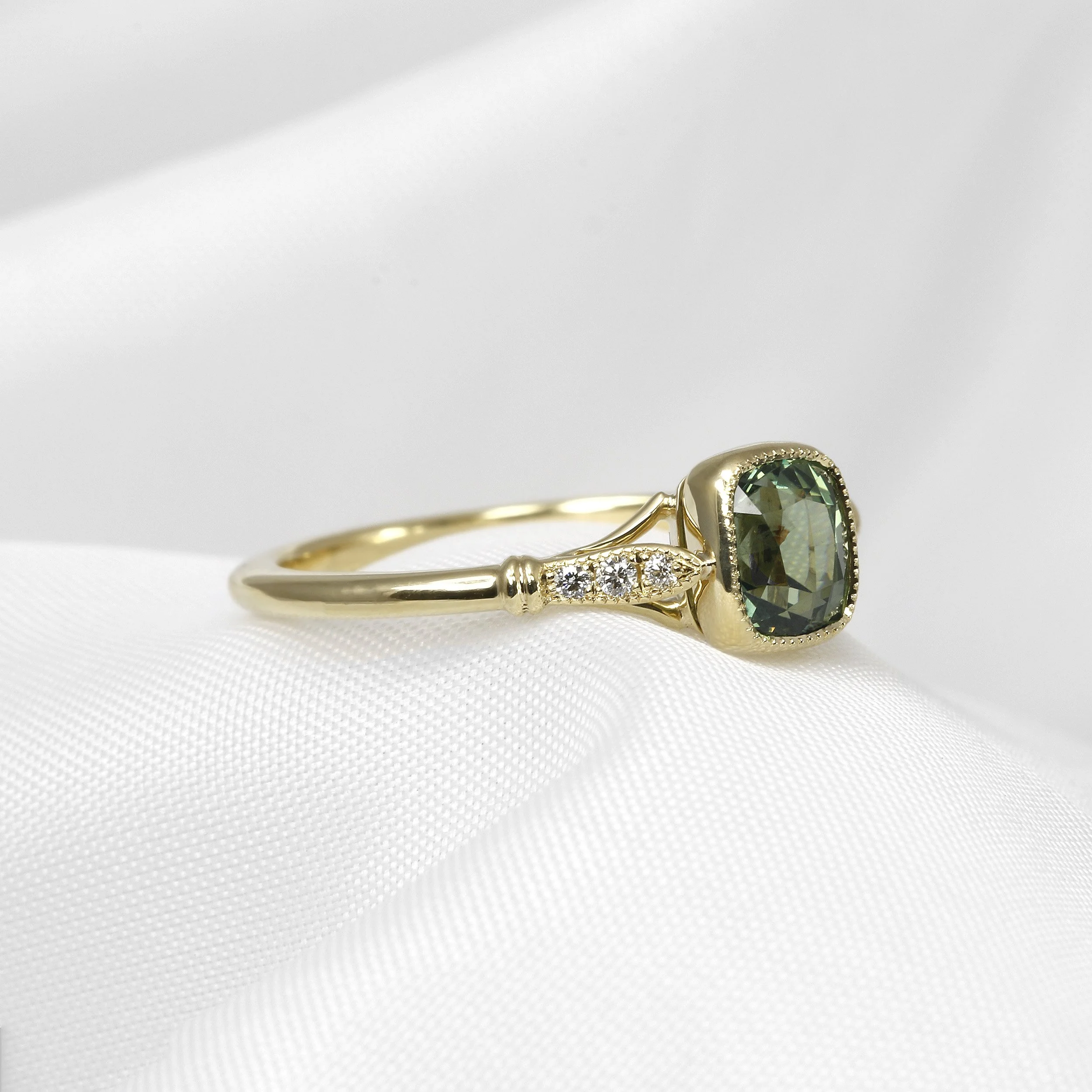 Teal Sapphire and Diamond Ring in Yellow Gold