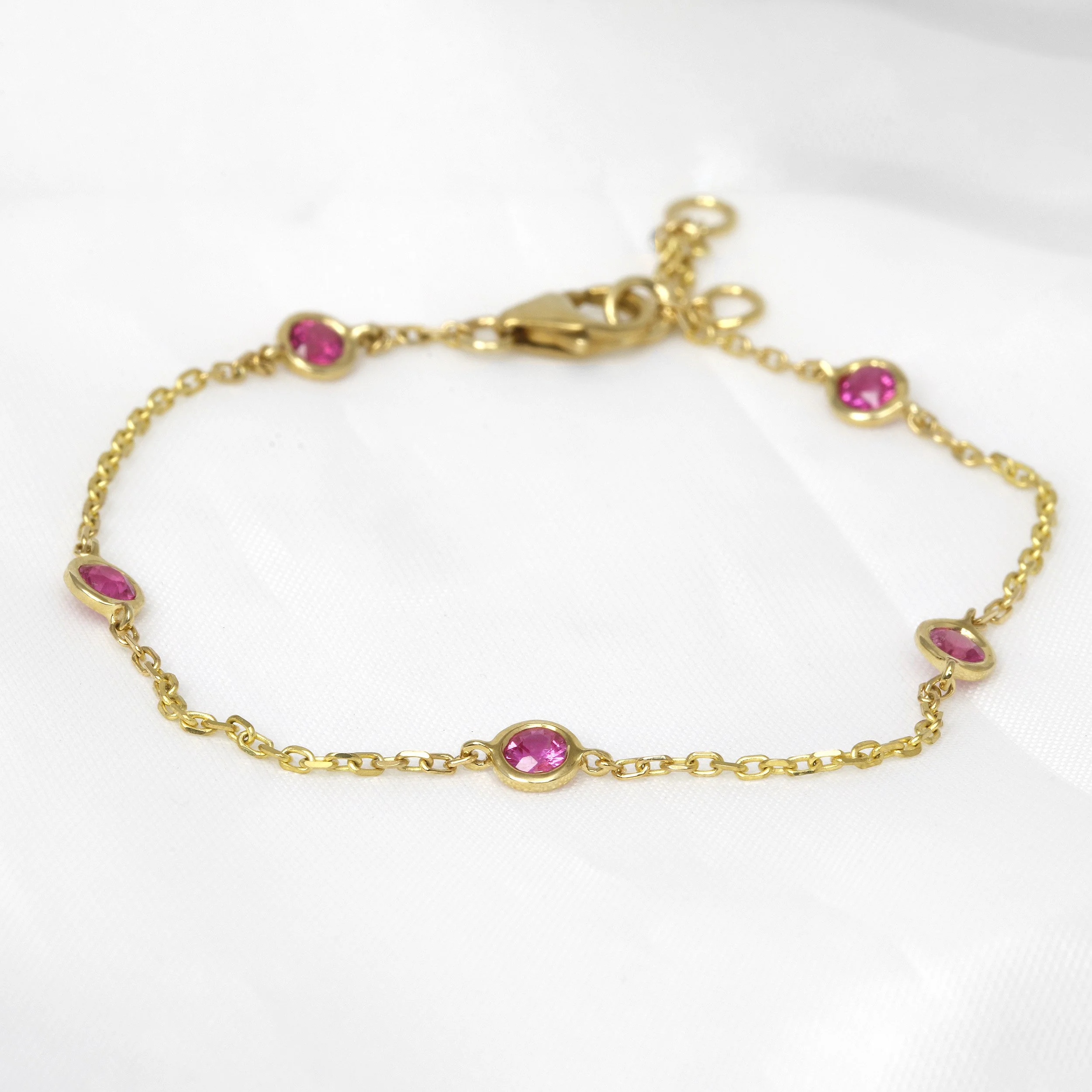 Pink Sapphire Station Bracelet in Yellow Gold