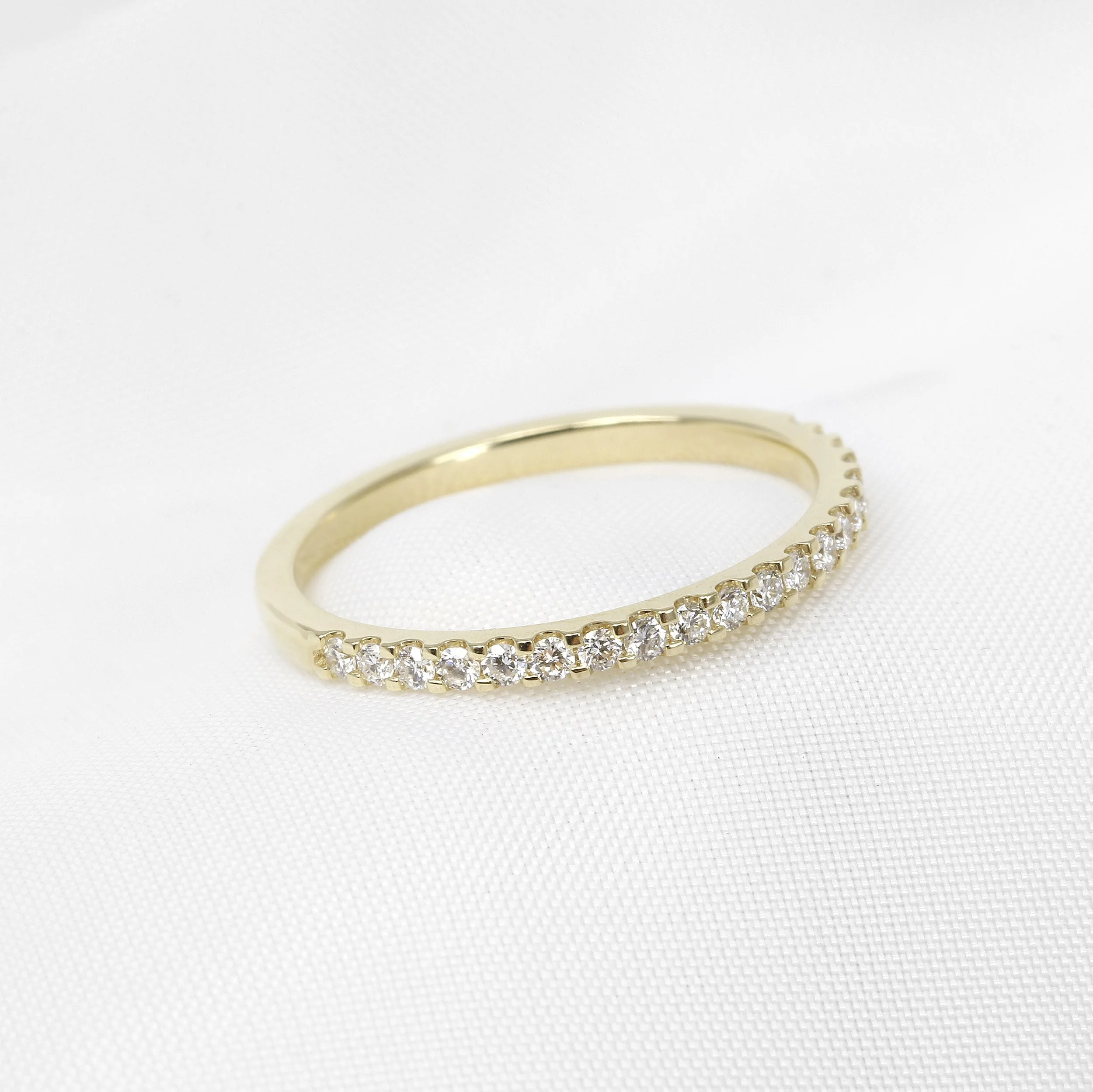 Cutaway Claw Set Diamond Eternity Ring in 9ct Yellow Gold