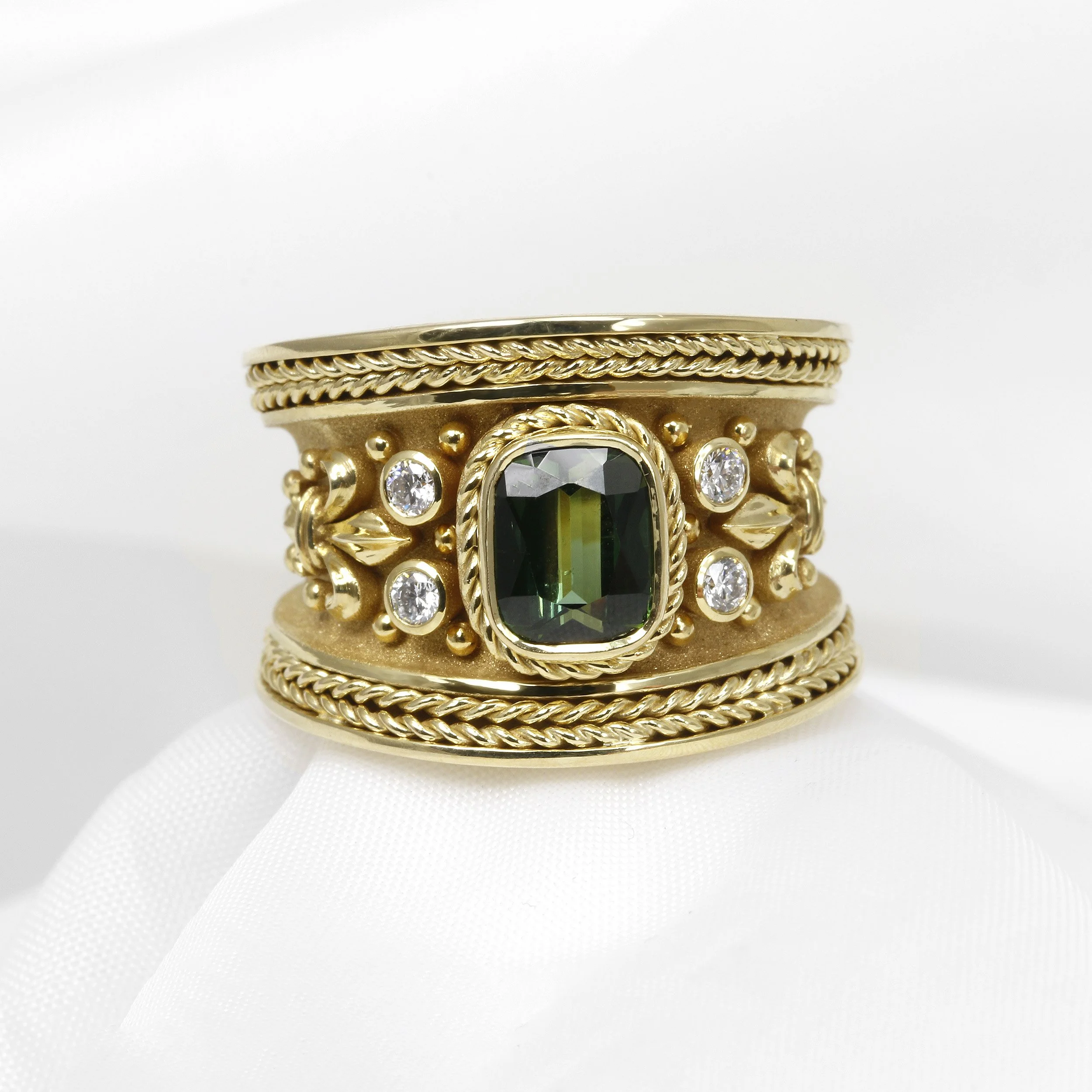 Gold and emerald ring