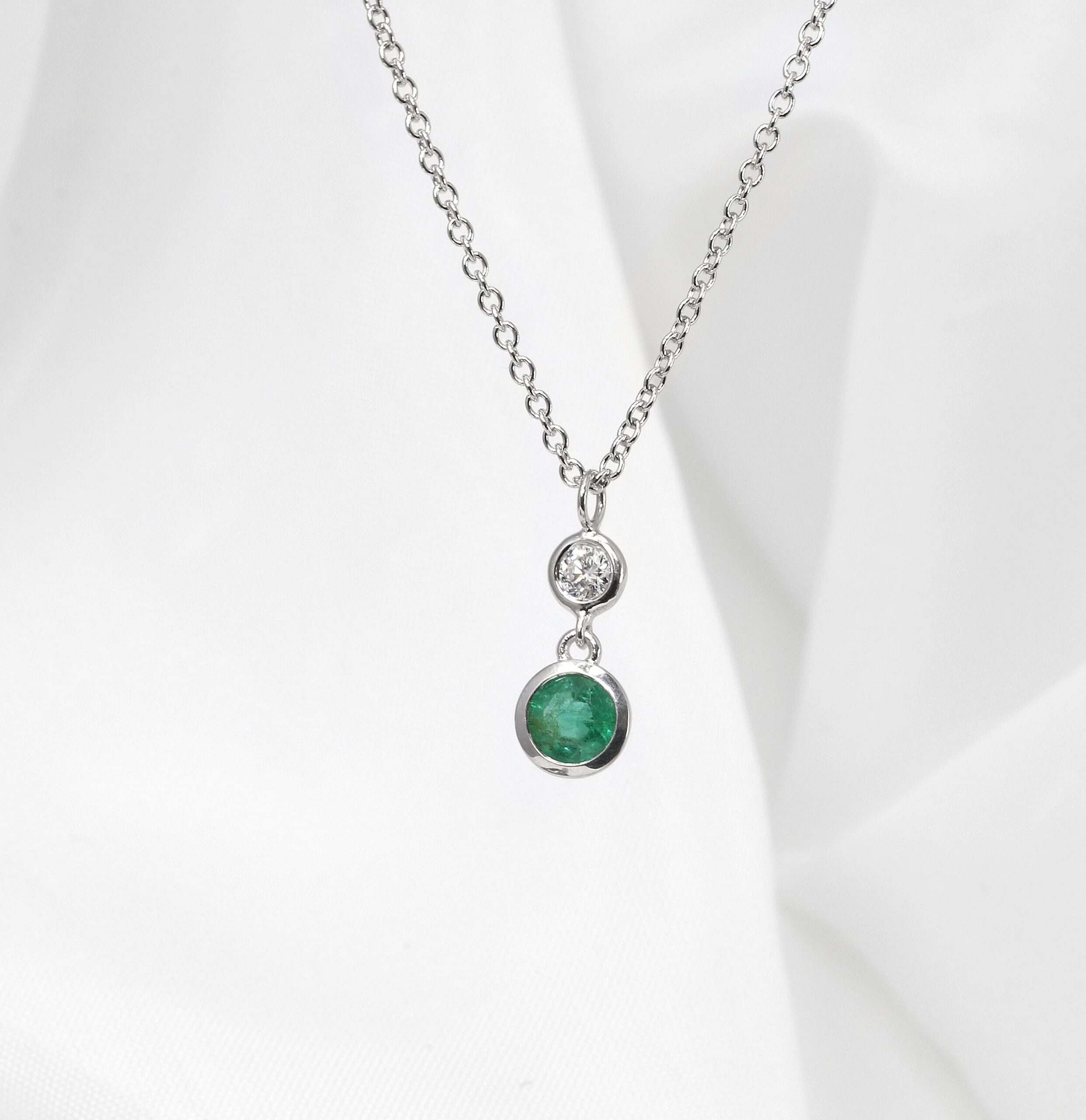 Emerald and Diamond Drop Pendant in White Gold